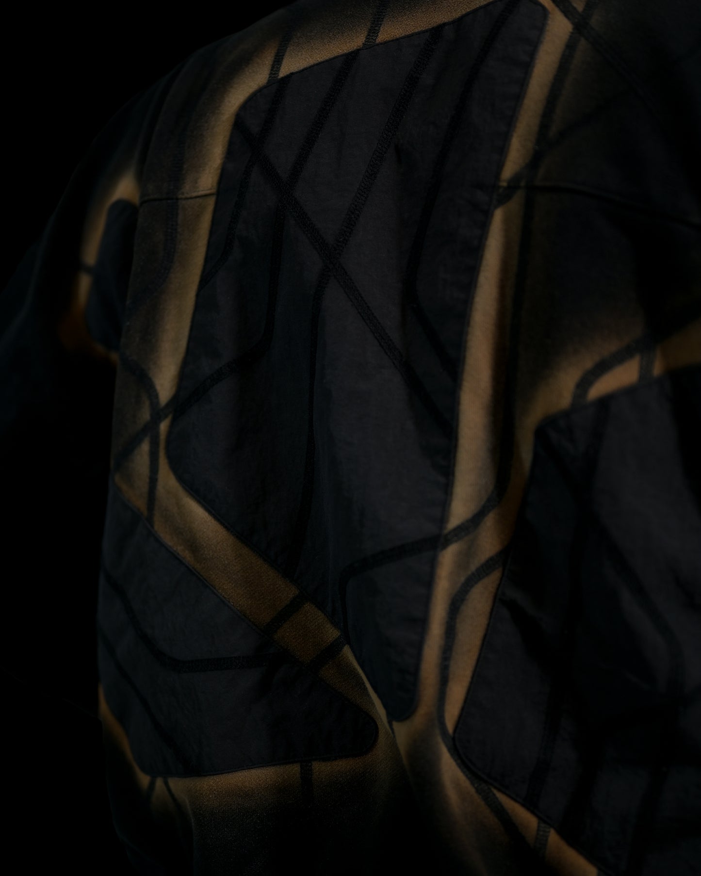 black eclipse air brushed archive streetwear hoodie, detail close up