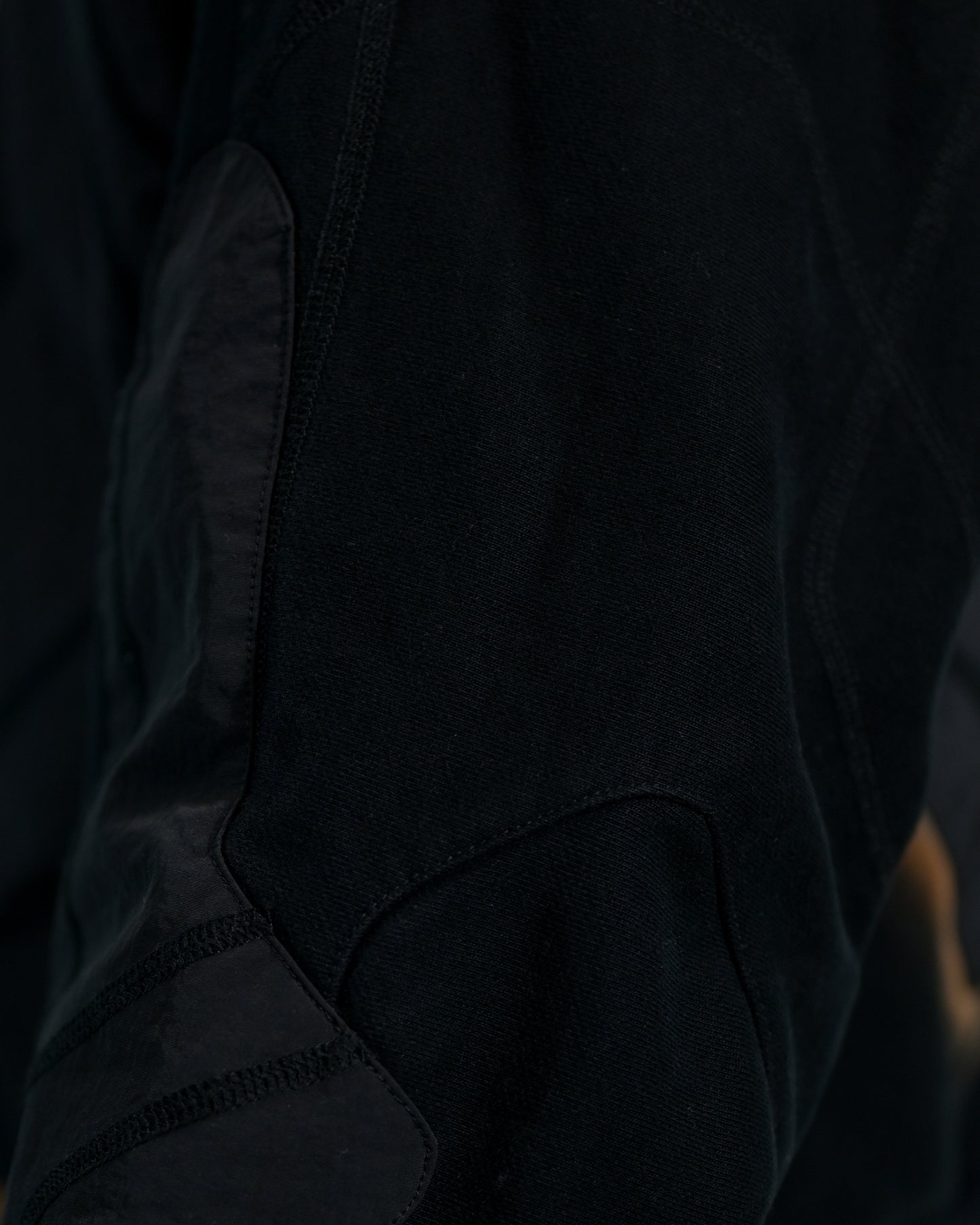 black eclipse air brushed archive streetwear hoodie, close up