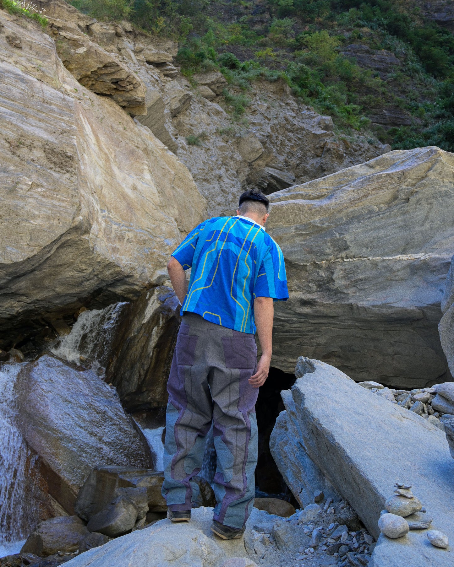 blue hydro sci-fi clothing shirt, back standing model view