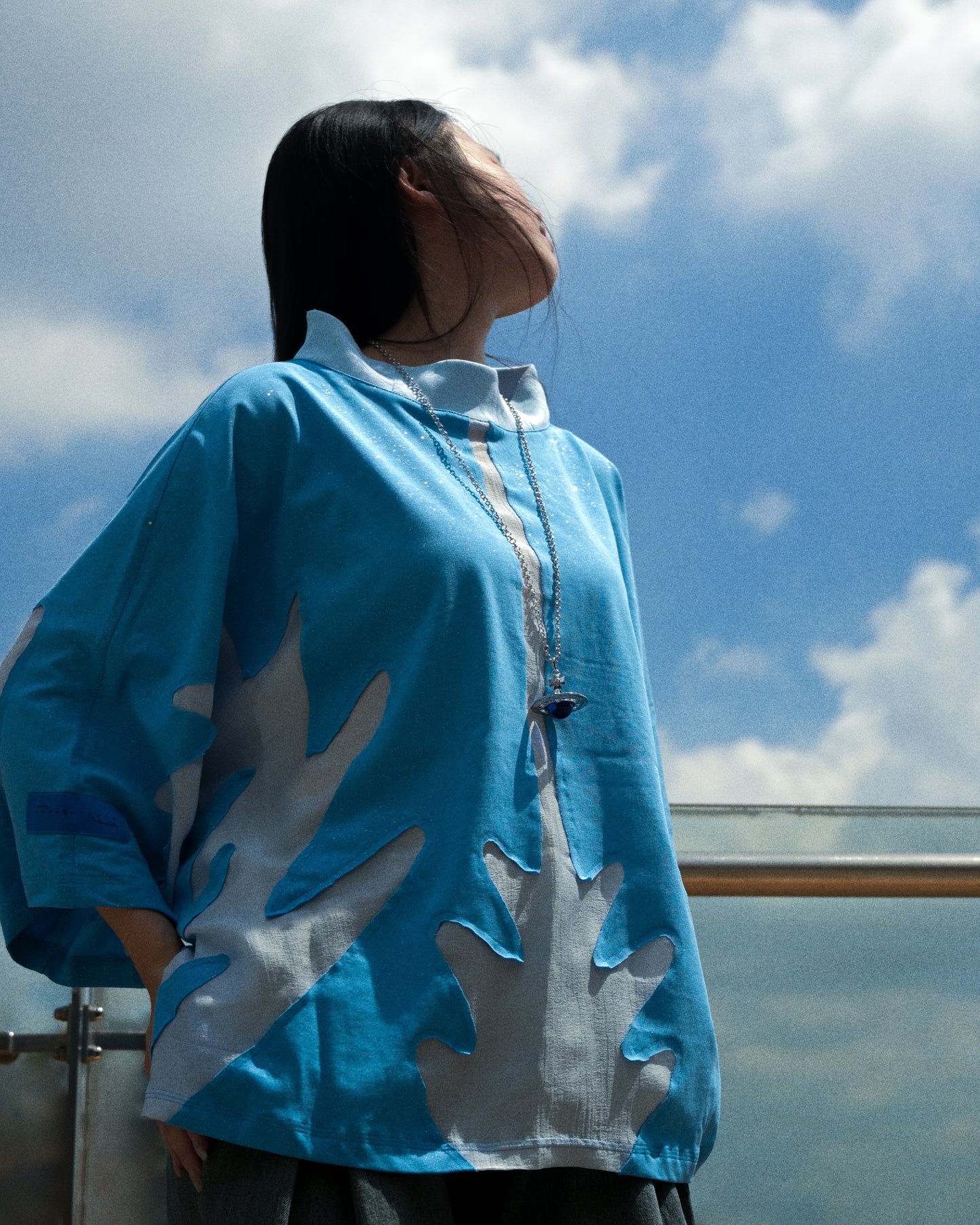 blue womens water world sci-fi shirt, side model view
