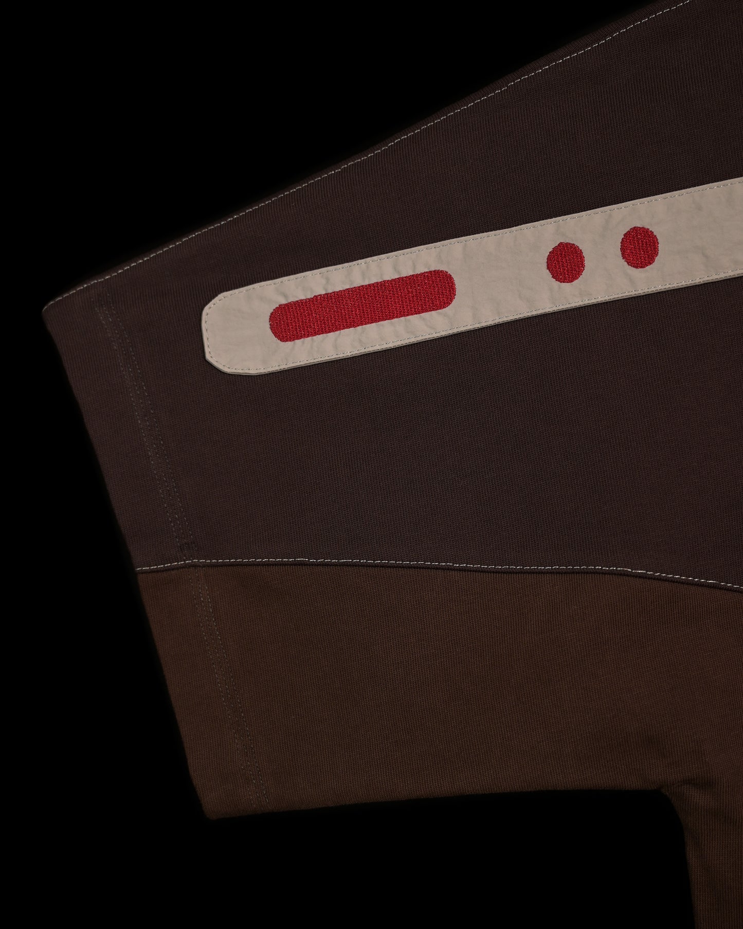 brown earth tone industrial terrain tee, stitching detail view