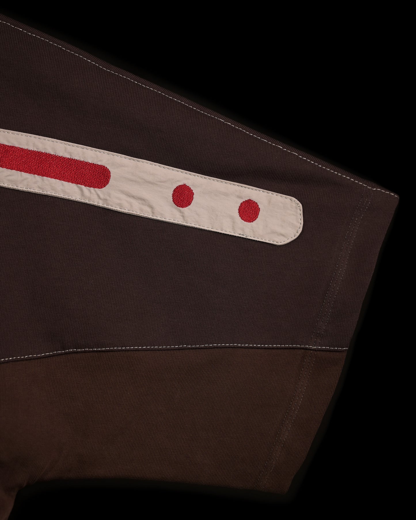 brown earth tone industrial terrain tee, sleeve embroidery
