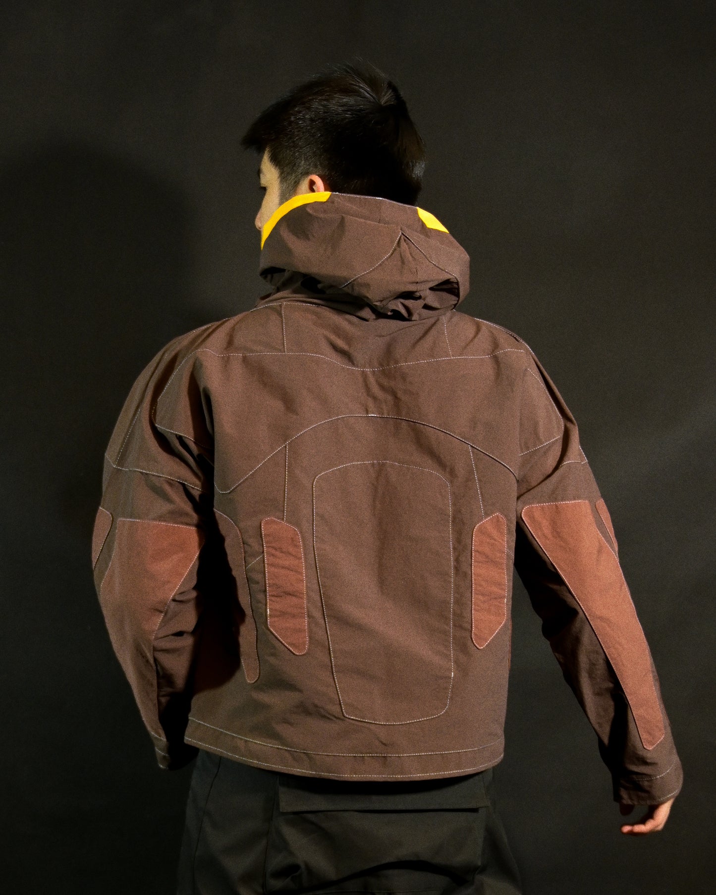brown industrial dystopian streetwear archive fashion jacket, back model view
