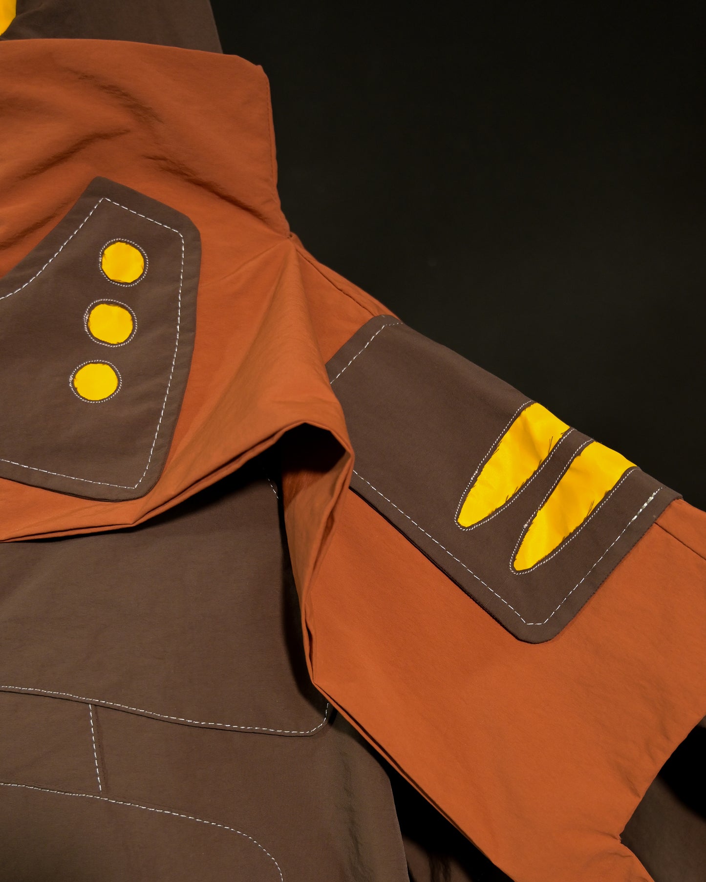 brown industrial dystopian streetwear archive fashion jacket, stitching detail view