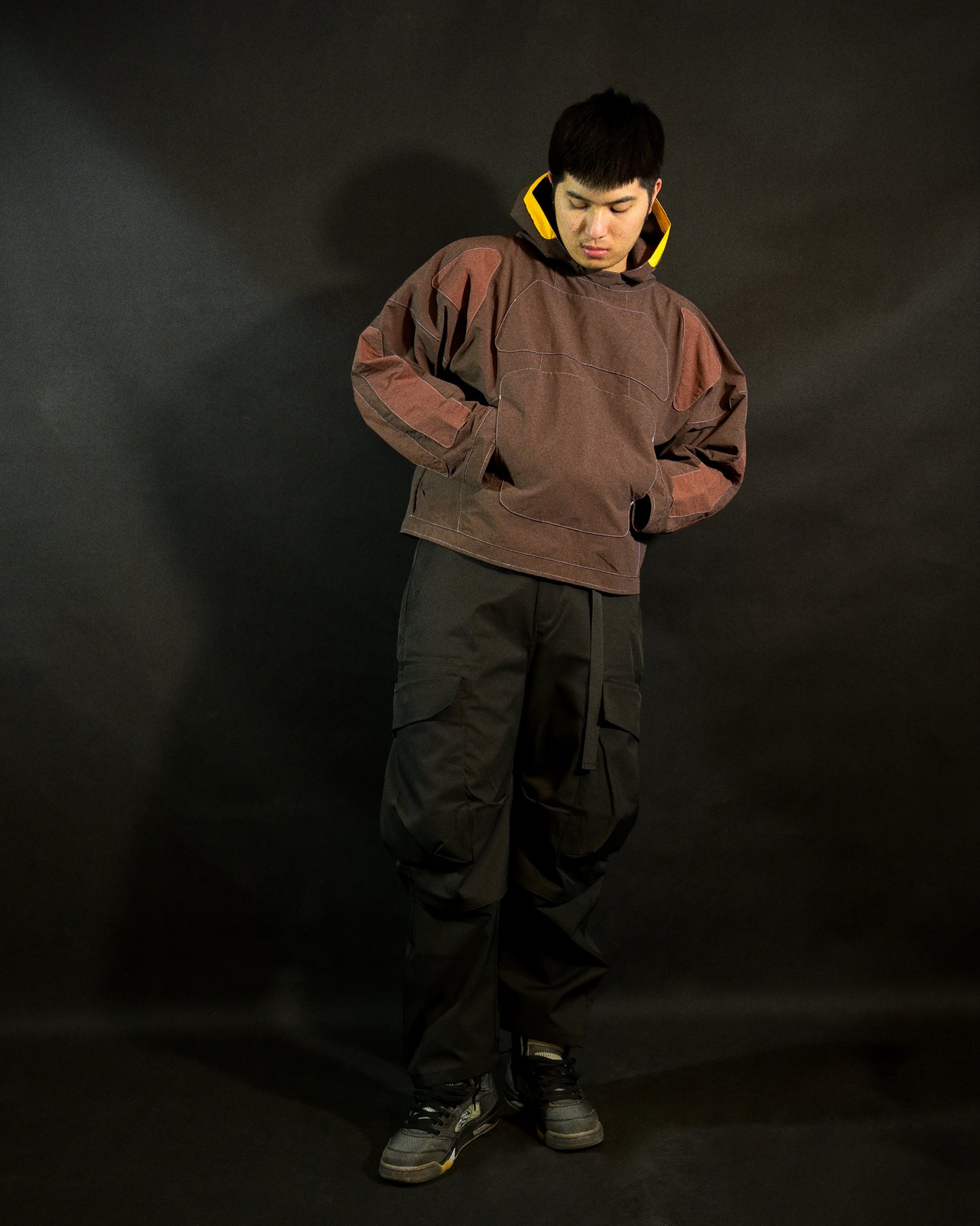 brown industrial dystopian streetwear archive fashion jacket, front model view