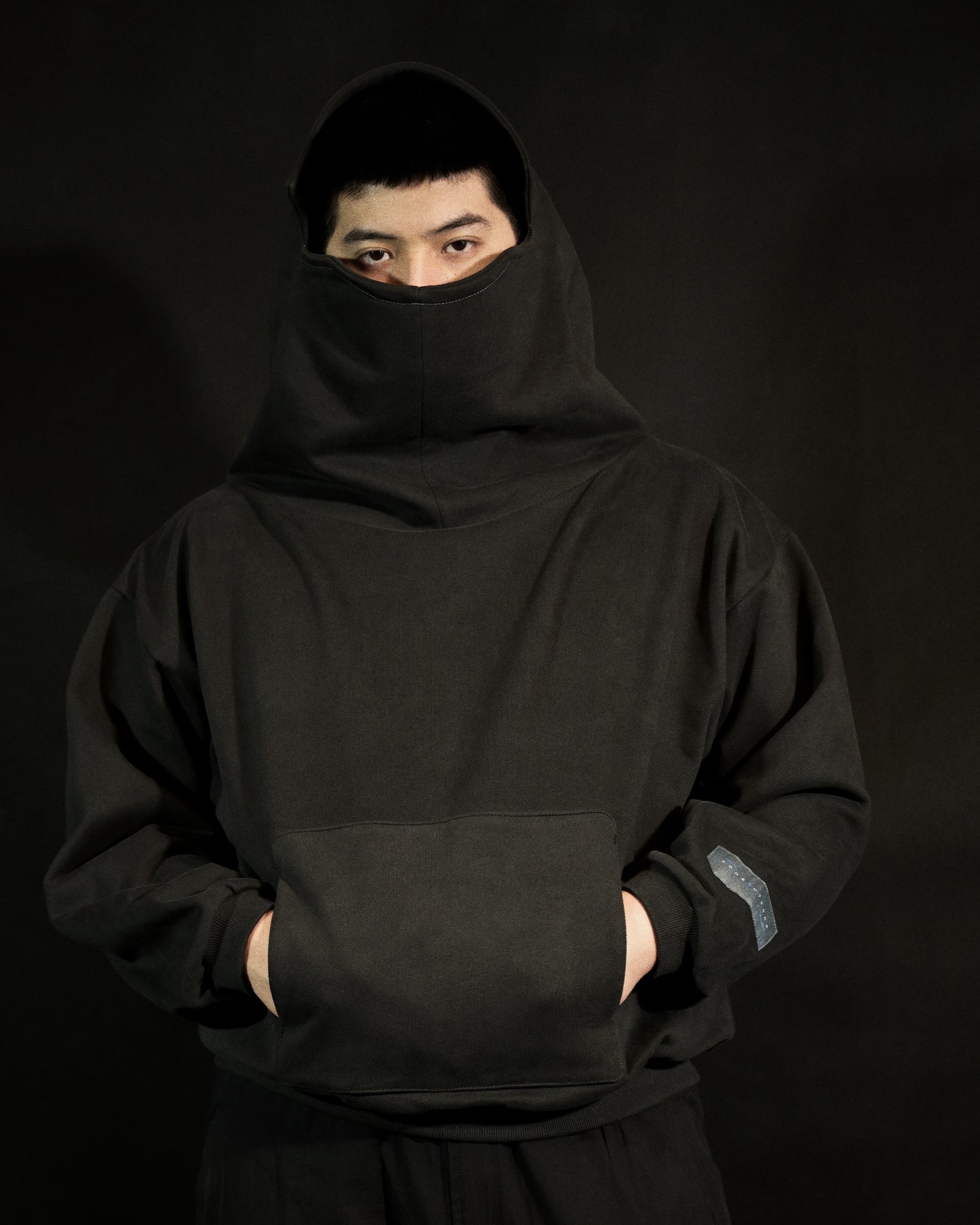 dark grey galactic sci-fi blank streetwear hoodie, front model view