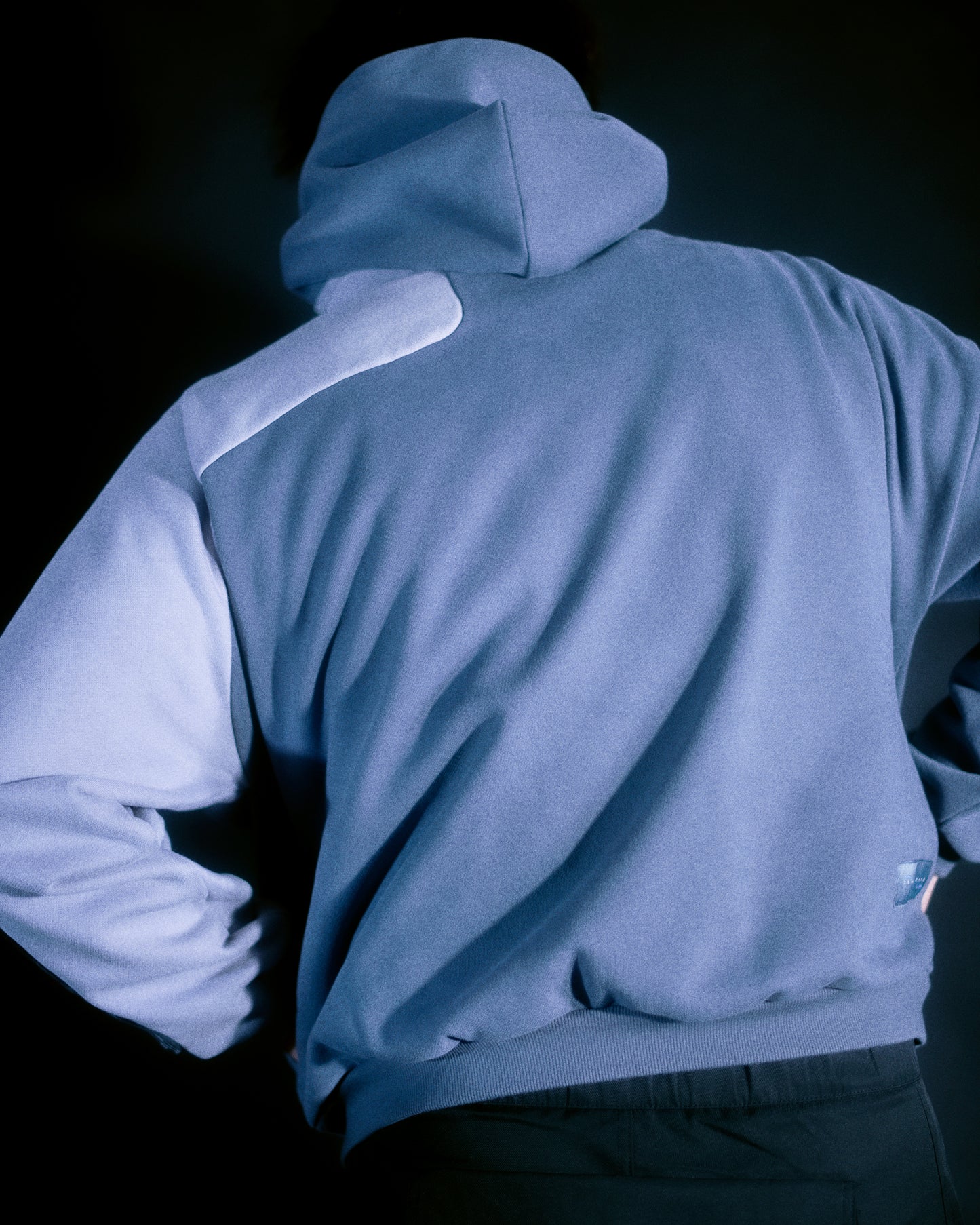 grey techwear grid futuristic pullover hoodie, back model view