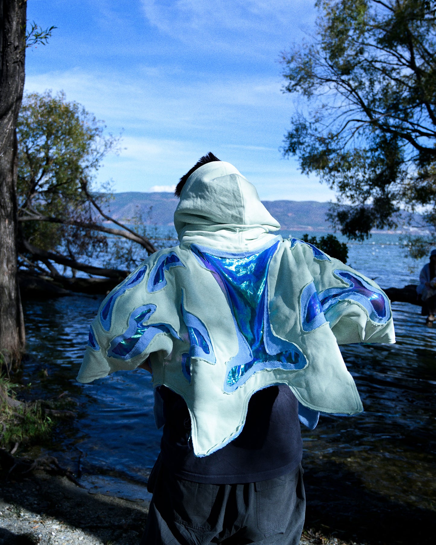 lucid coral aqua sci-fi clothing hoodie, back model view