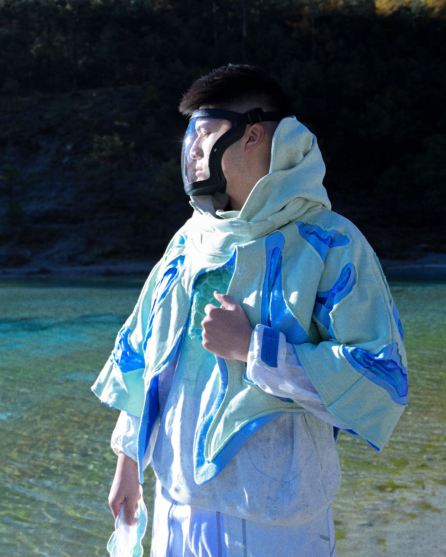 lucid coral aqua sci-fi clothing hoodie, side profile view