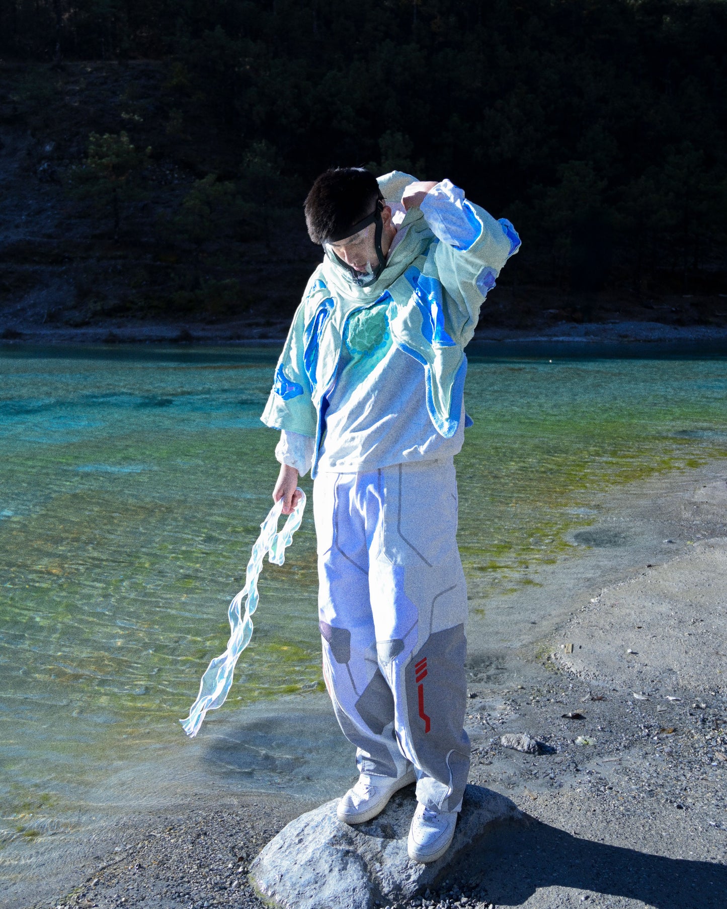 lucid coral aqua sci-fi clothing hoodie, standing model view