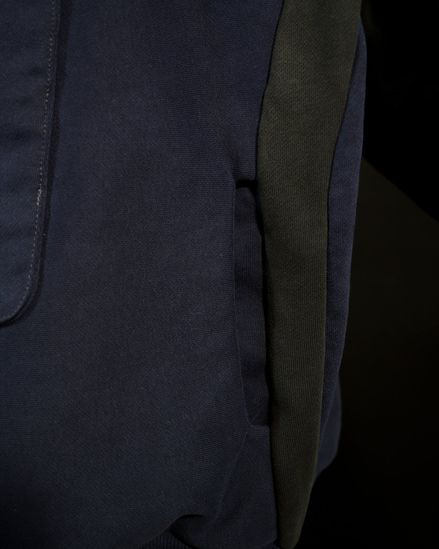 navy android robotic ski hoodie, hidden side pocket view