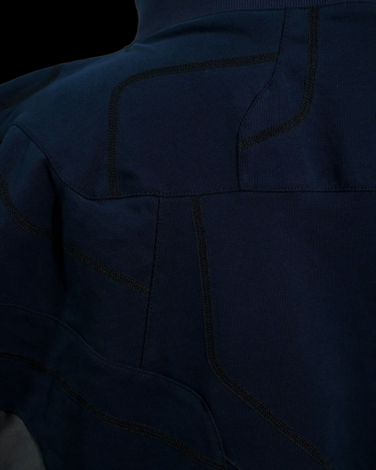 navy cloaking experimental sci-fi jacket, stitching detail close up