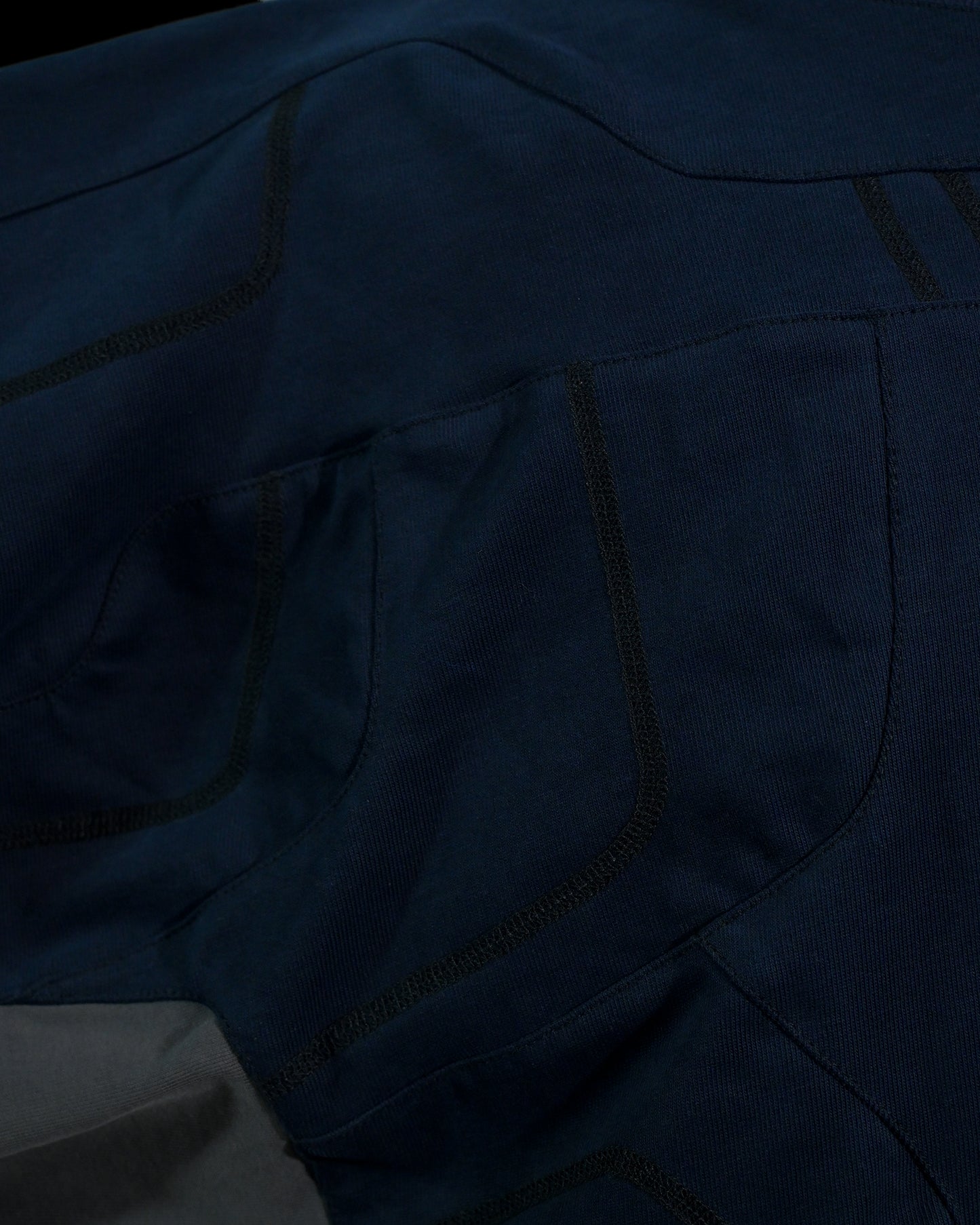 navy cloaking experimental sci-fi jacket, 3 needle overlock stitching view