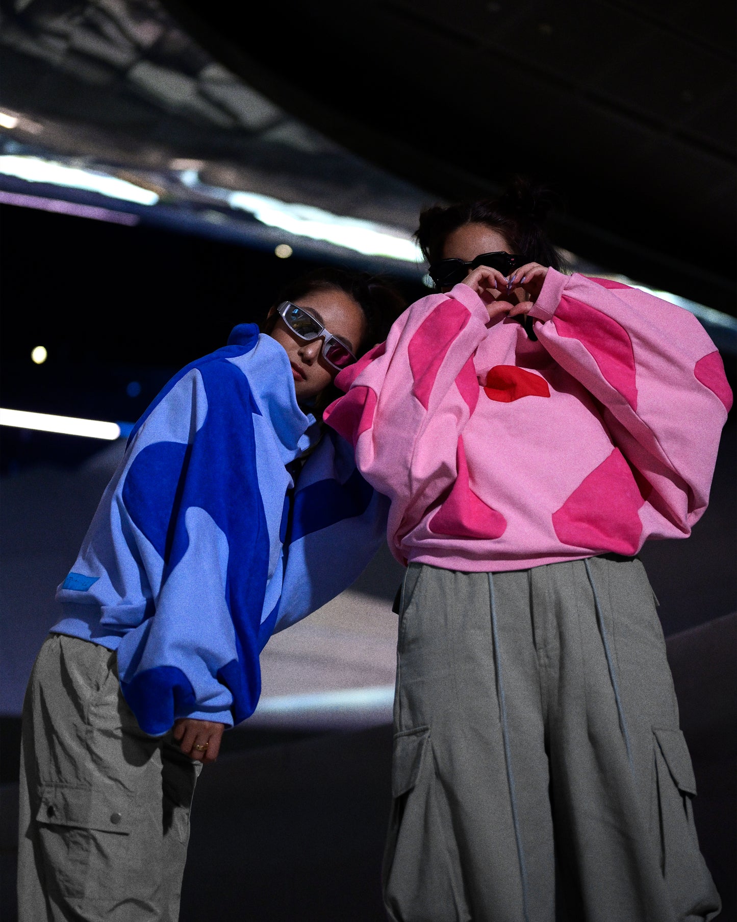 pink artificial love cyberpunk cropped women's sweater, two models view