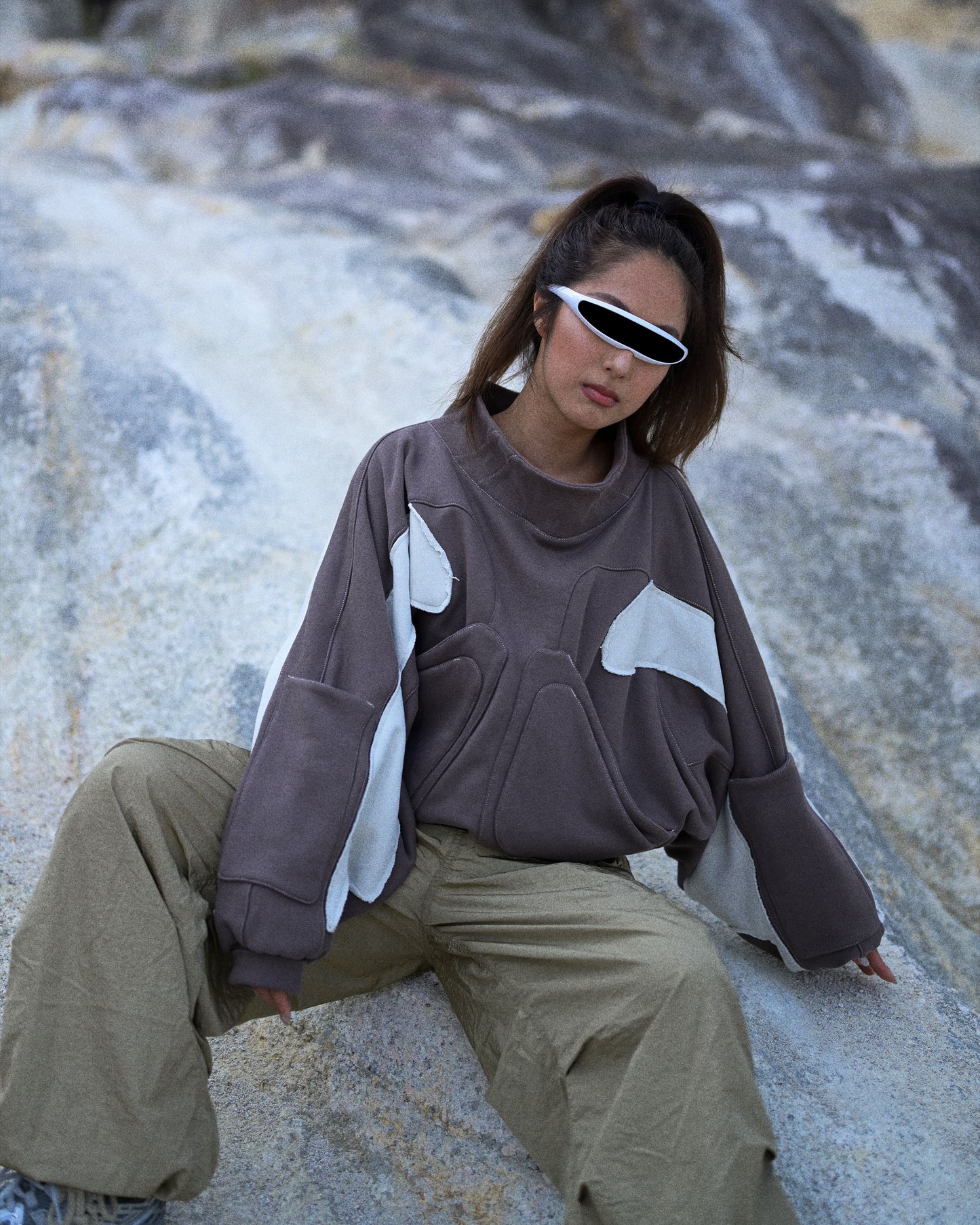 sci-fi women's mocha cropped sweater, front sitting model view