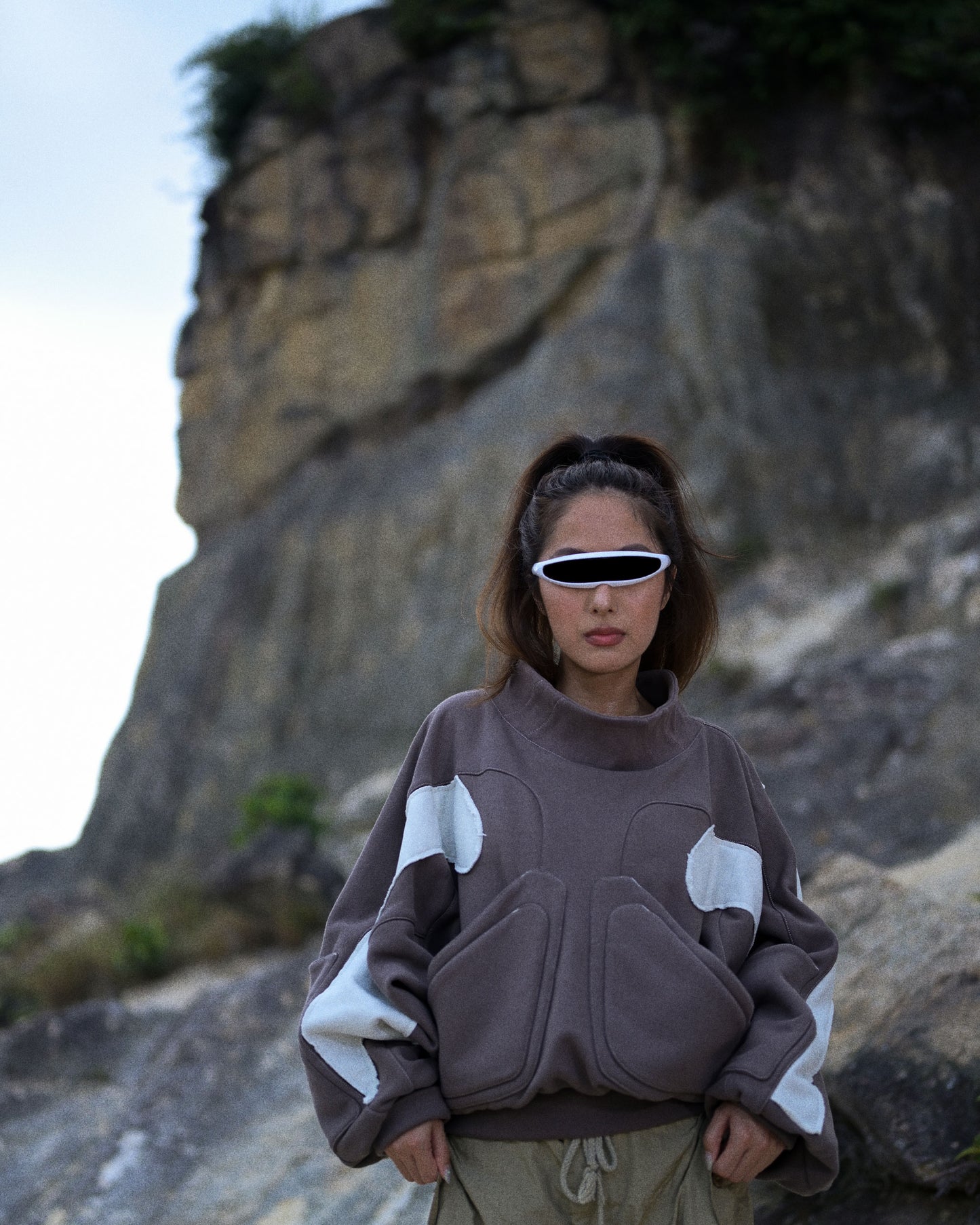 sci-fi women's mocha cropped sweater, front model cliff view
