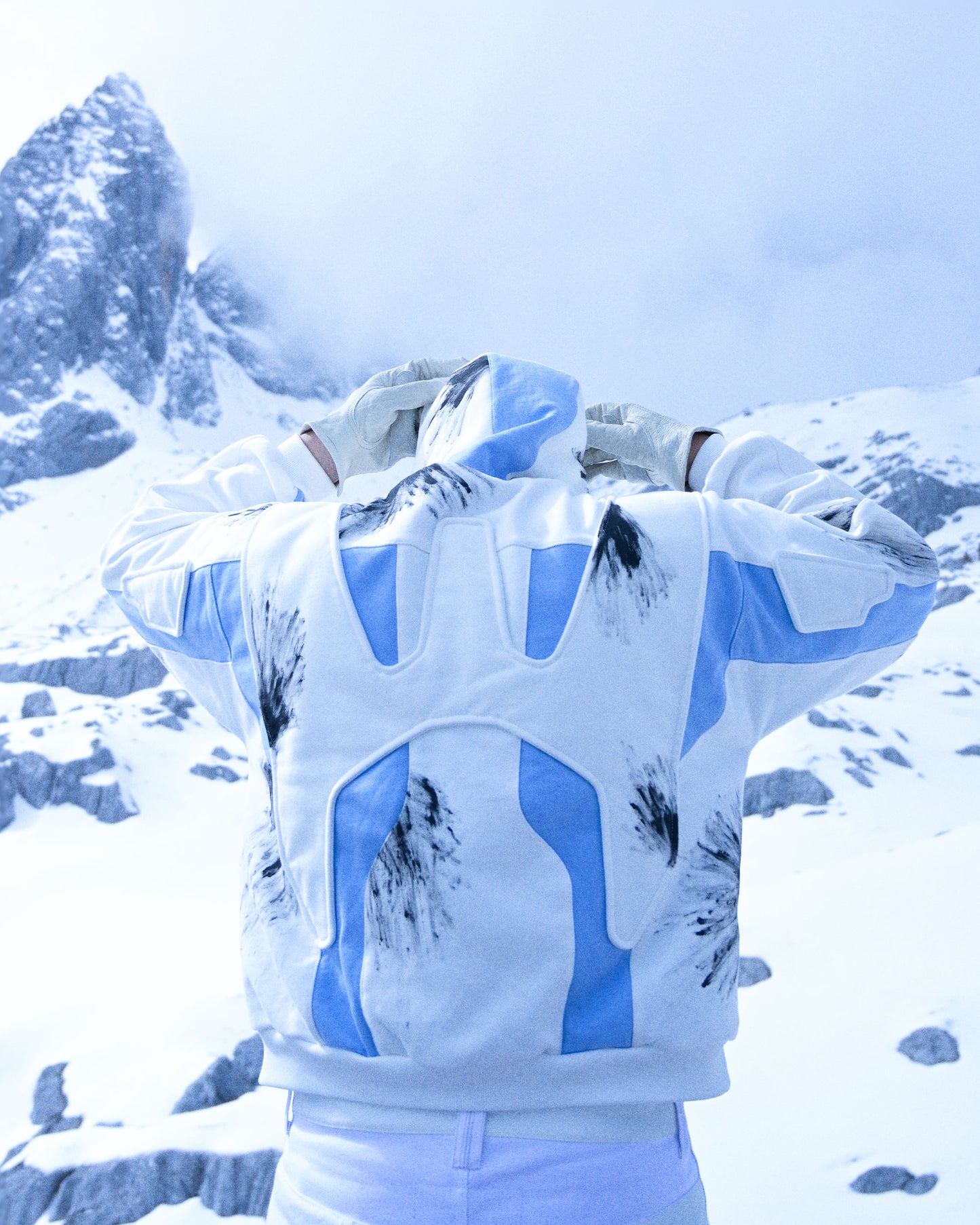 white futuristic cyber core ski jacket, back model view