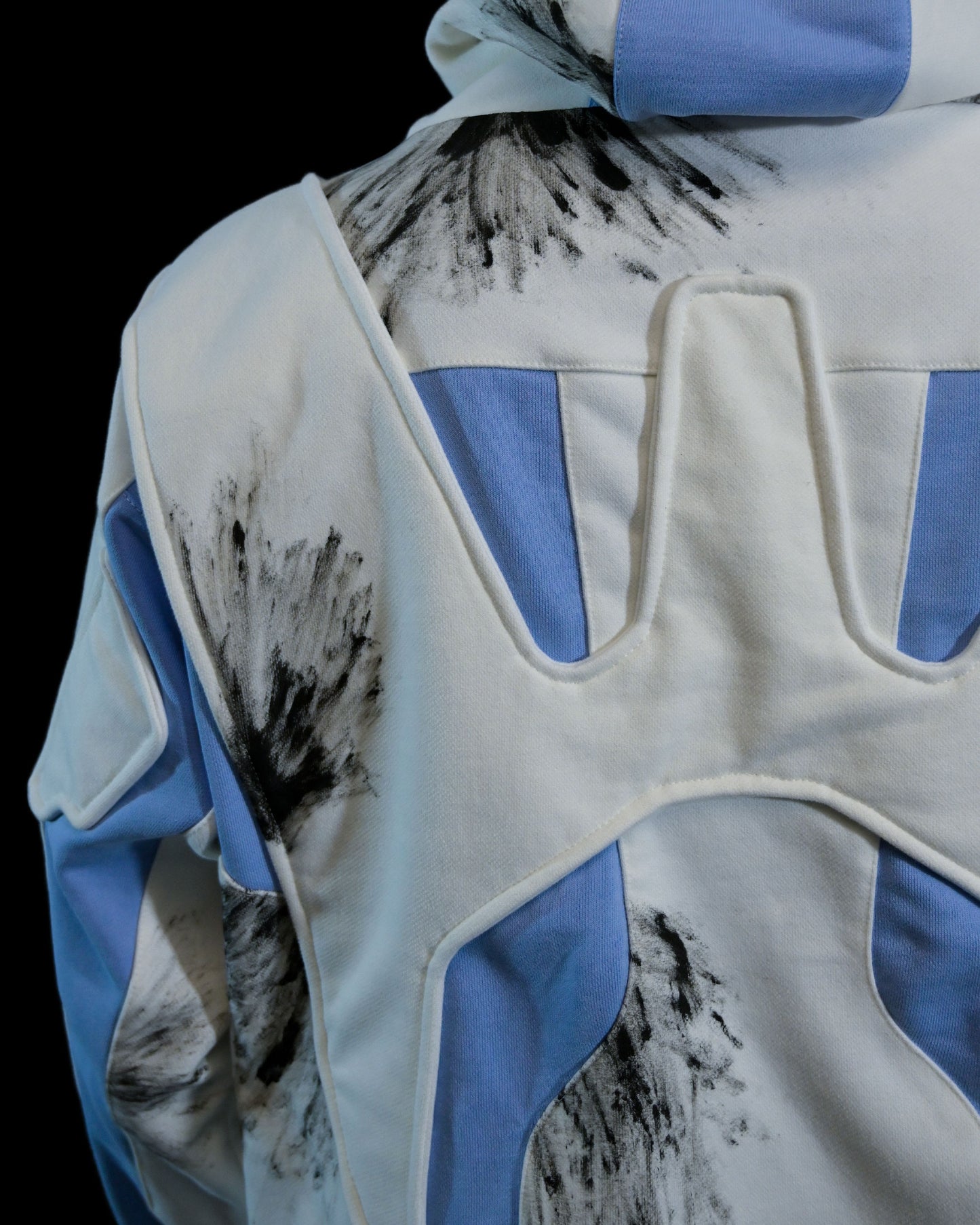 white futuristic cyber core ski jacket, back stitching detail