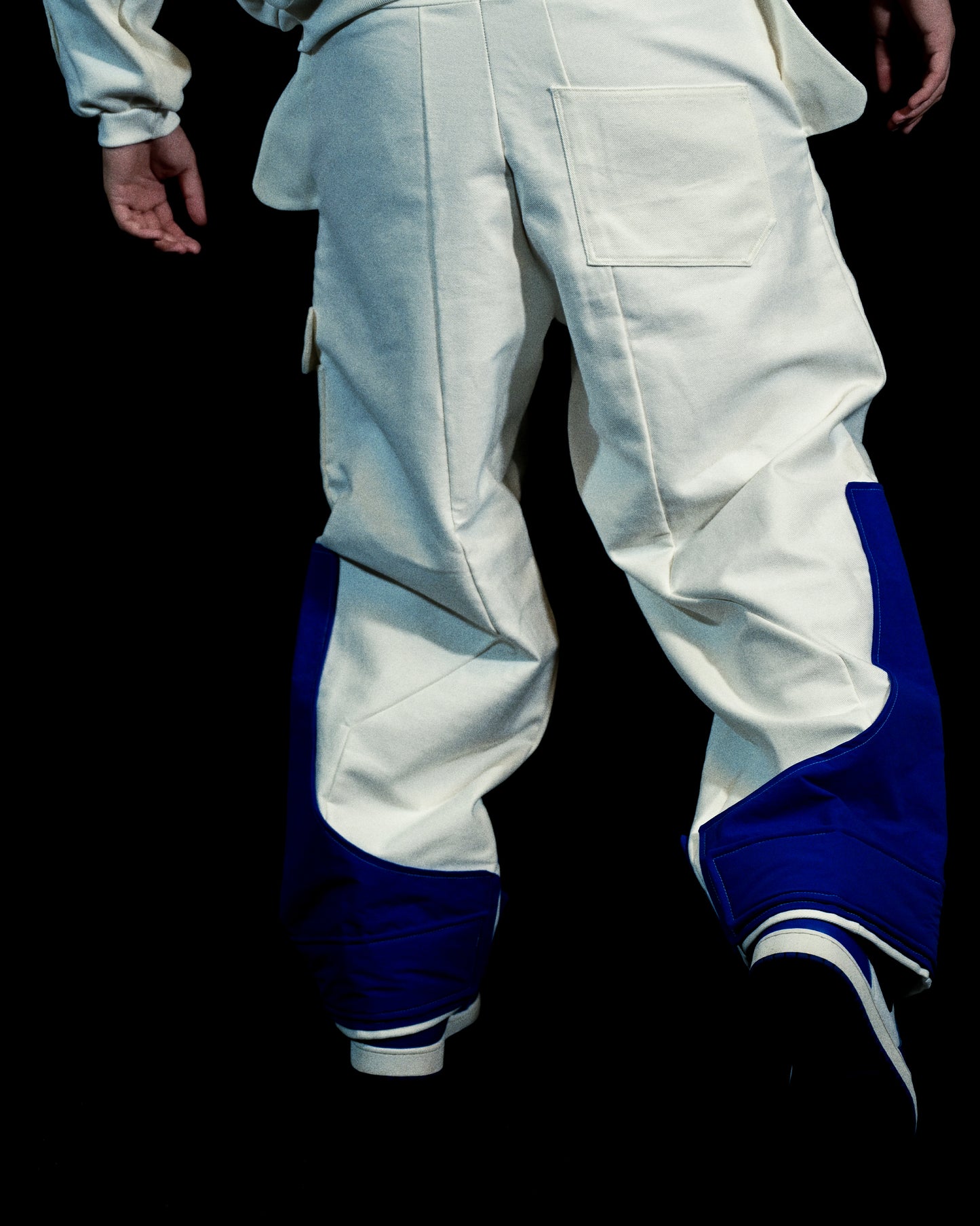 white lunar space streetwear ski pants, back model view