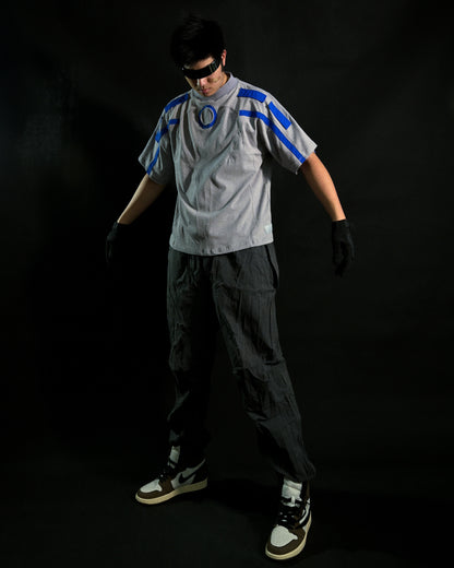 Grey grid cybercore cyberpunk underground fashion tee, front model standing view