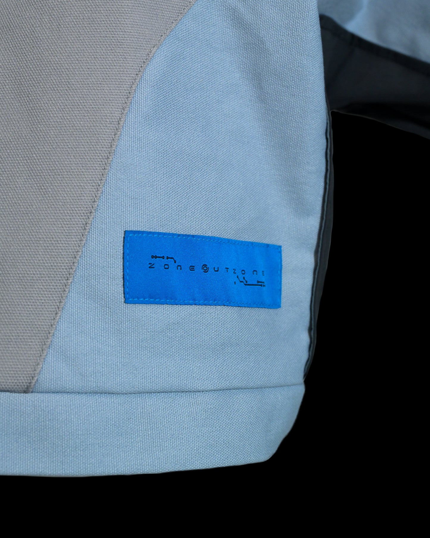 alien sci fi off world bounty hunter men jacket, woven tag detail view