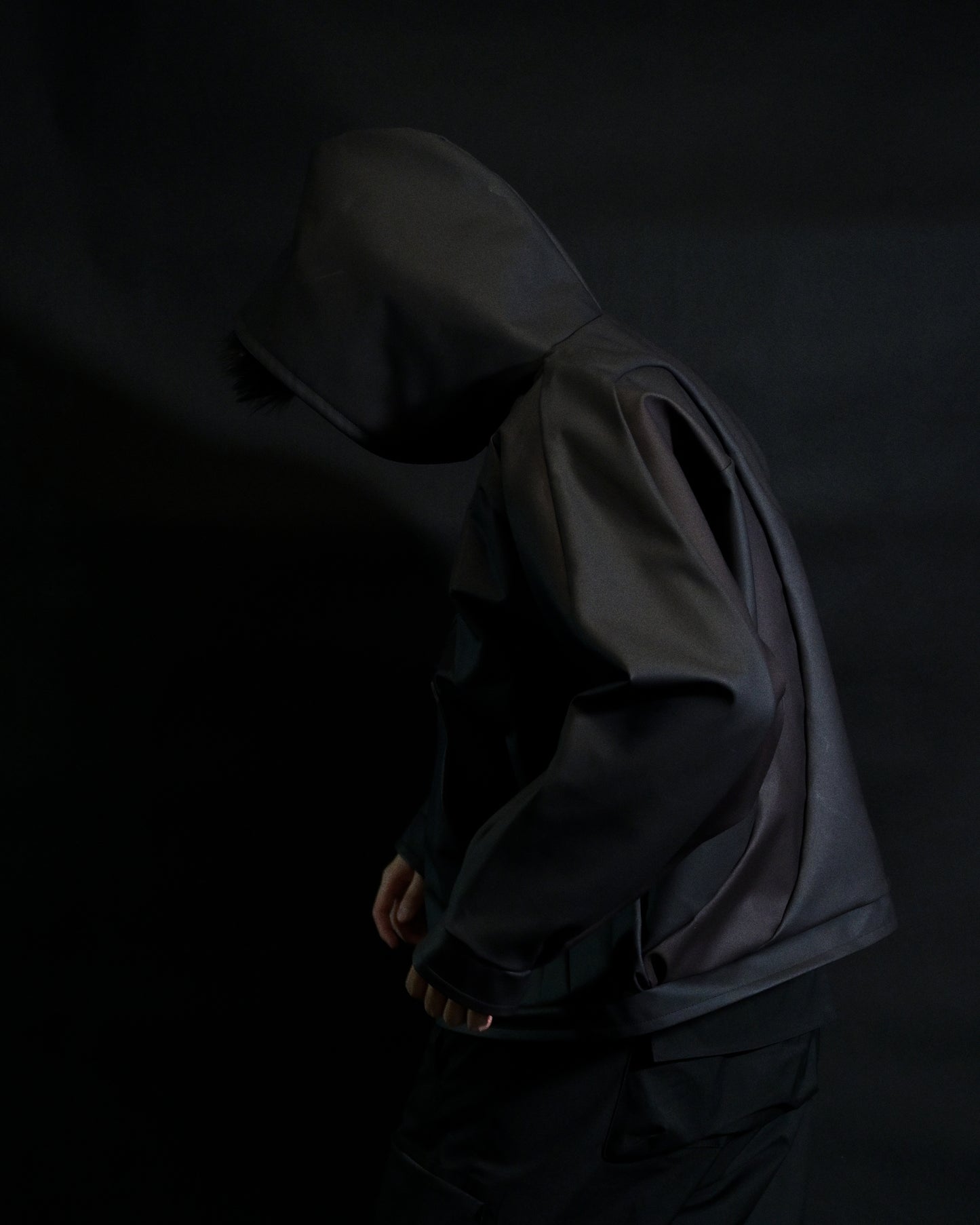 black archive fashion heat reactive leather hoodie, side model view