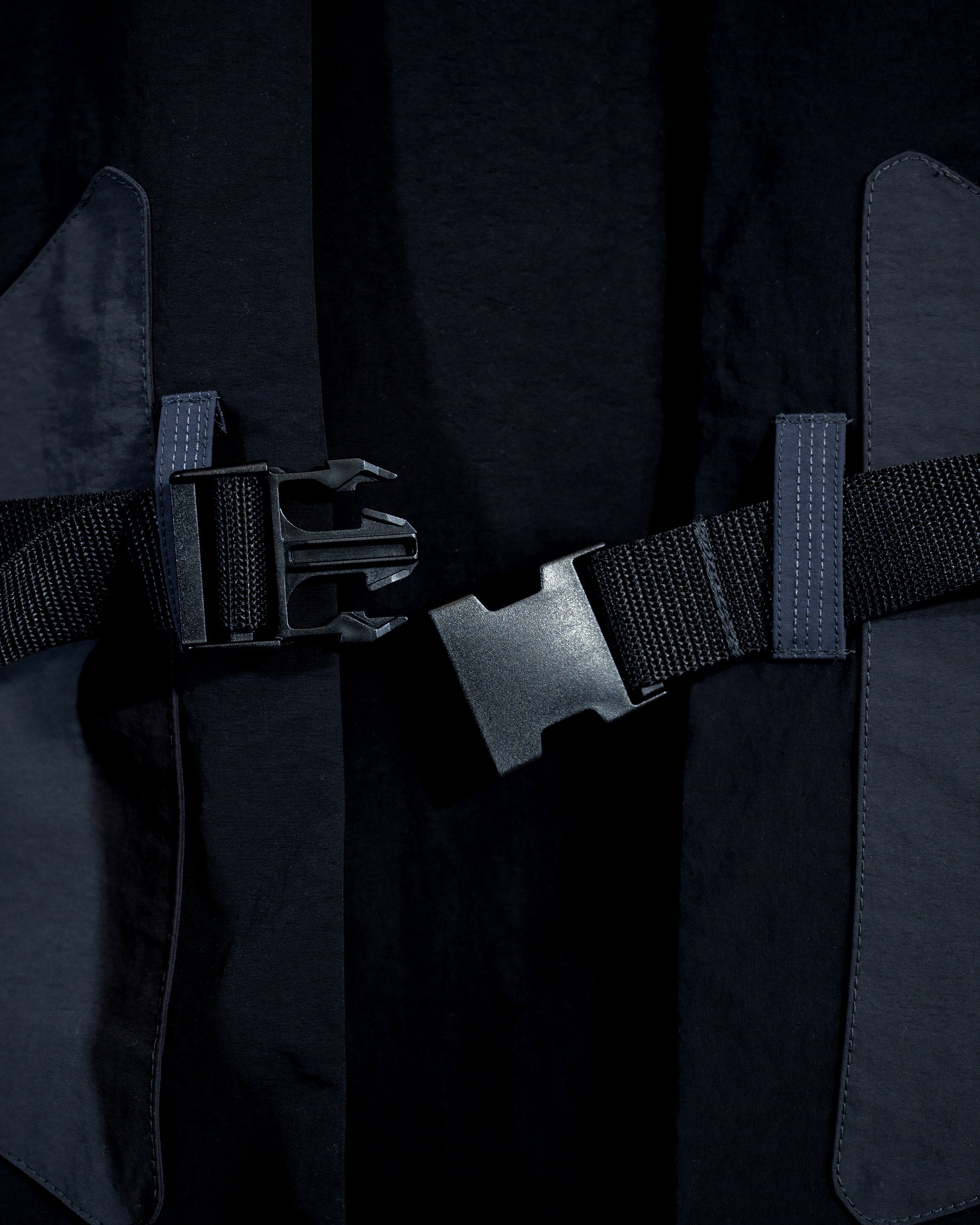 black dystopian post apocalyptic windbreaker vest, buckle shot