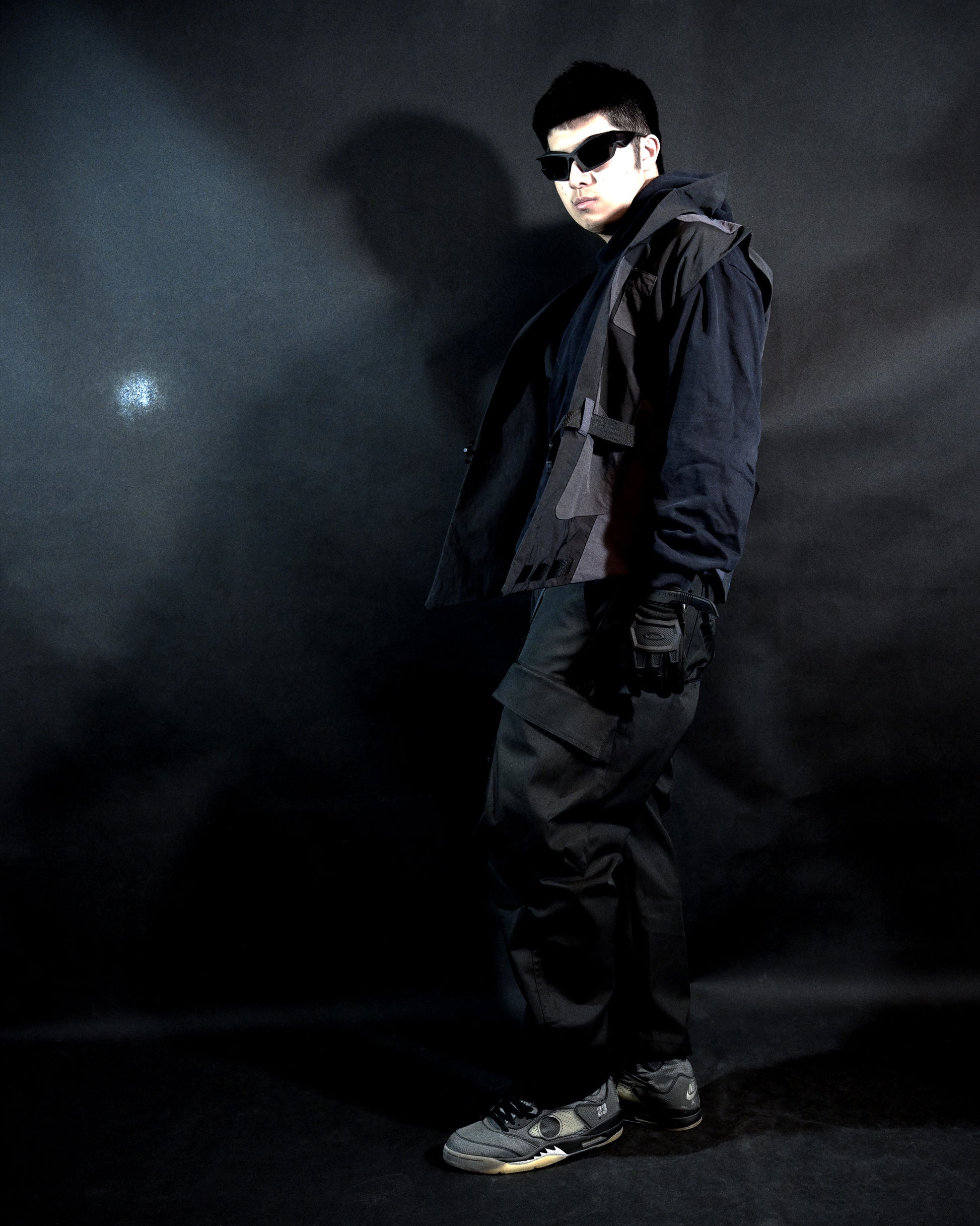 black dystopian post apocalyptic windbreaker vest, model