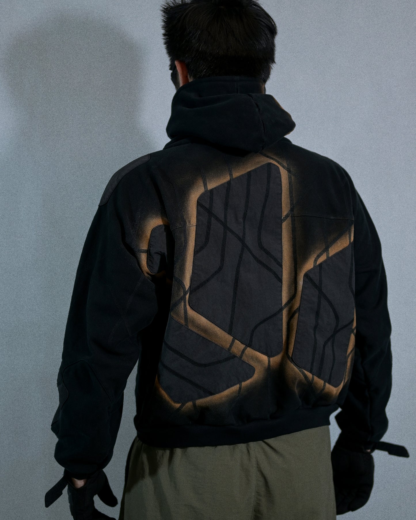 black eclipse air brushed archive streetwear hoodie, back model view
