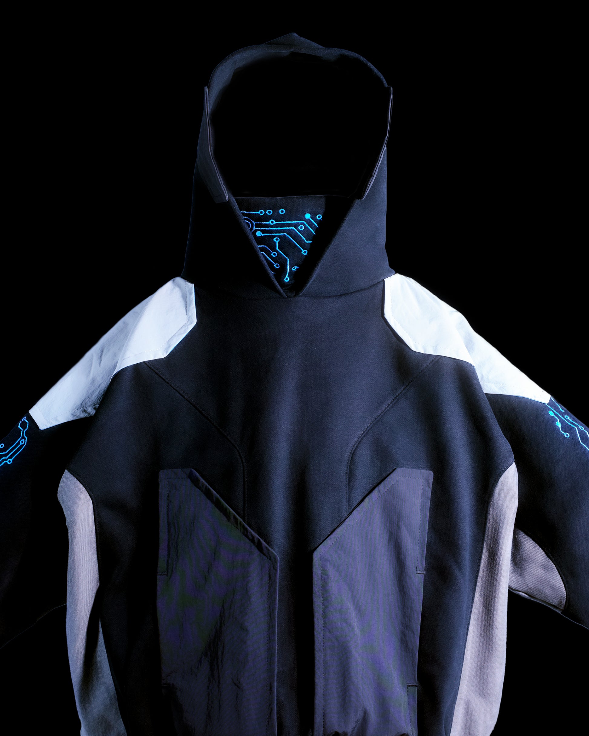 Black hoodie with futuristic grid tech wear style, front close up view