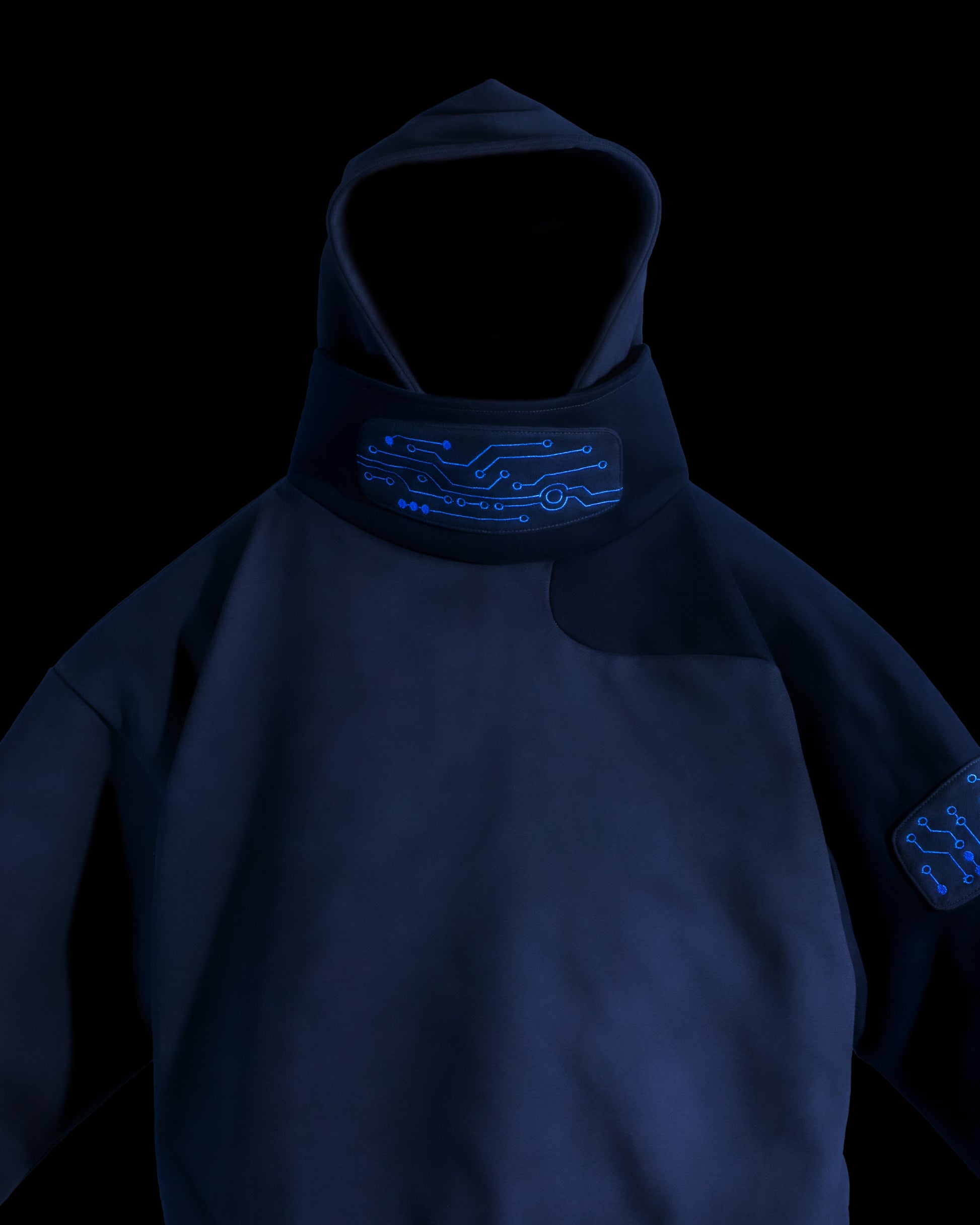 black grid circuit techwear cyberpunk hoodie, front close up view
