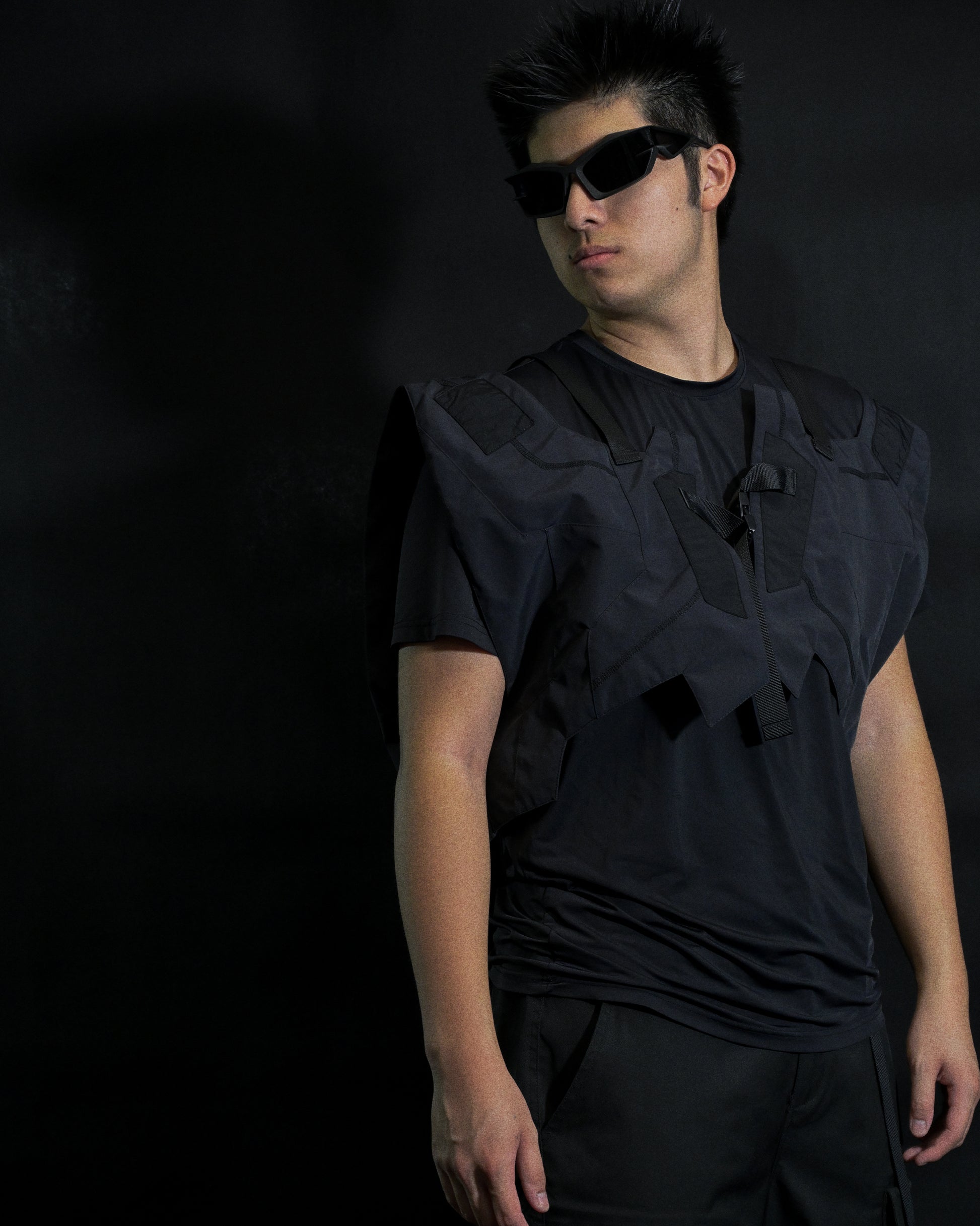 black tactical military dystopian vest, front model view