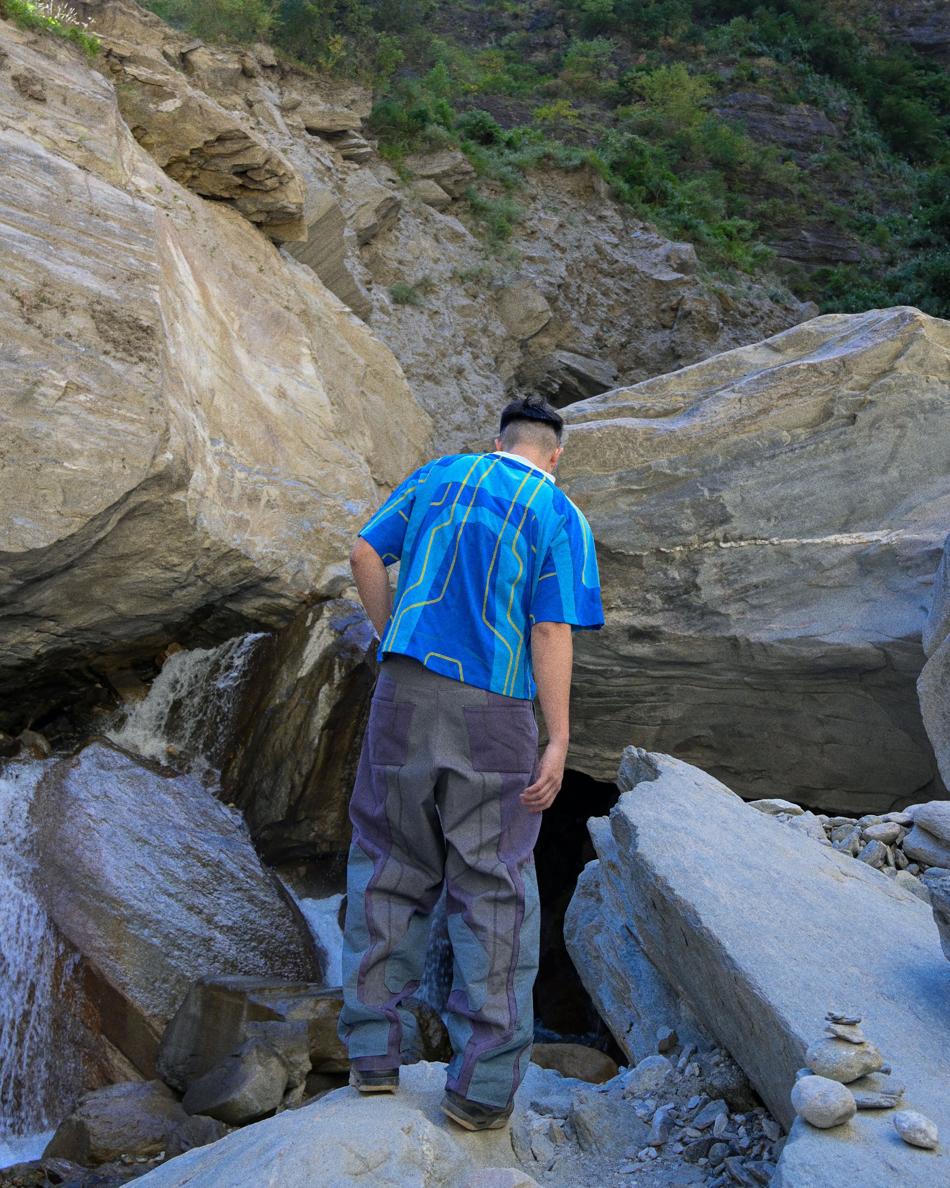 blue hydro sci-fi clothing shirt, back standing model view