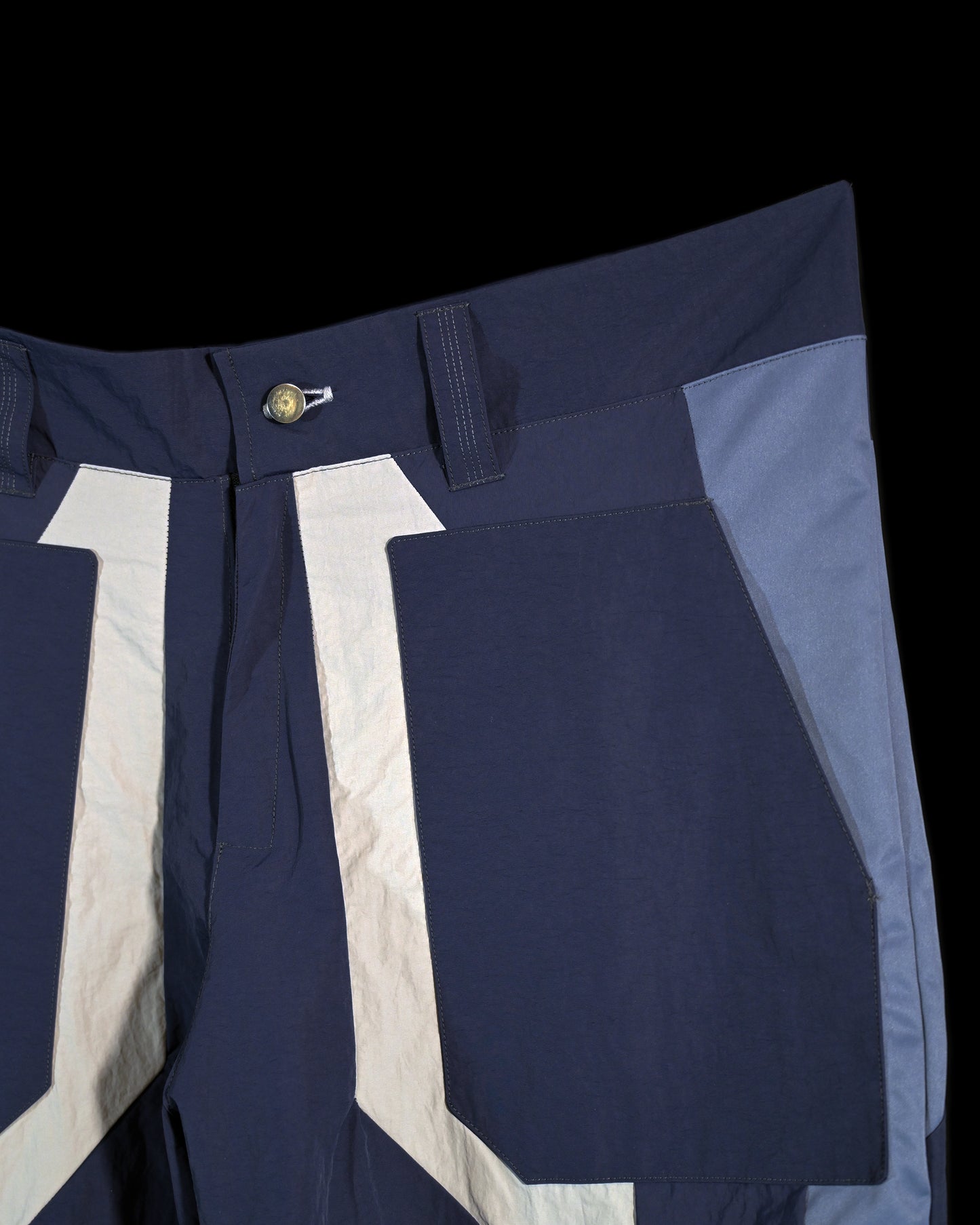 blue techno techwear cyberspace pants, front pockets view