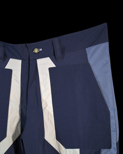blue techno techwear cyberspace pants, front pockets view