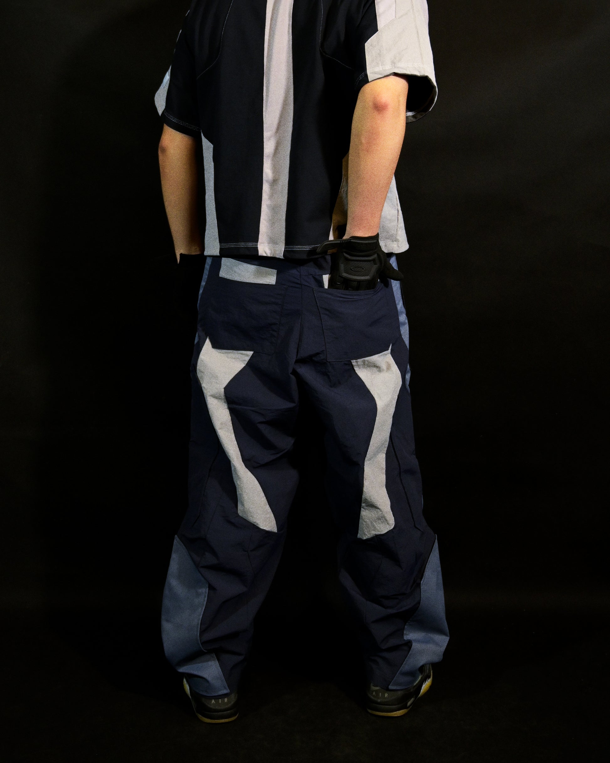 blue techno techwear cyberspace pants, back model view