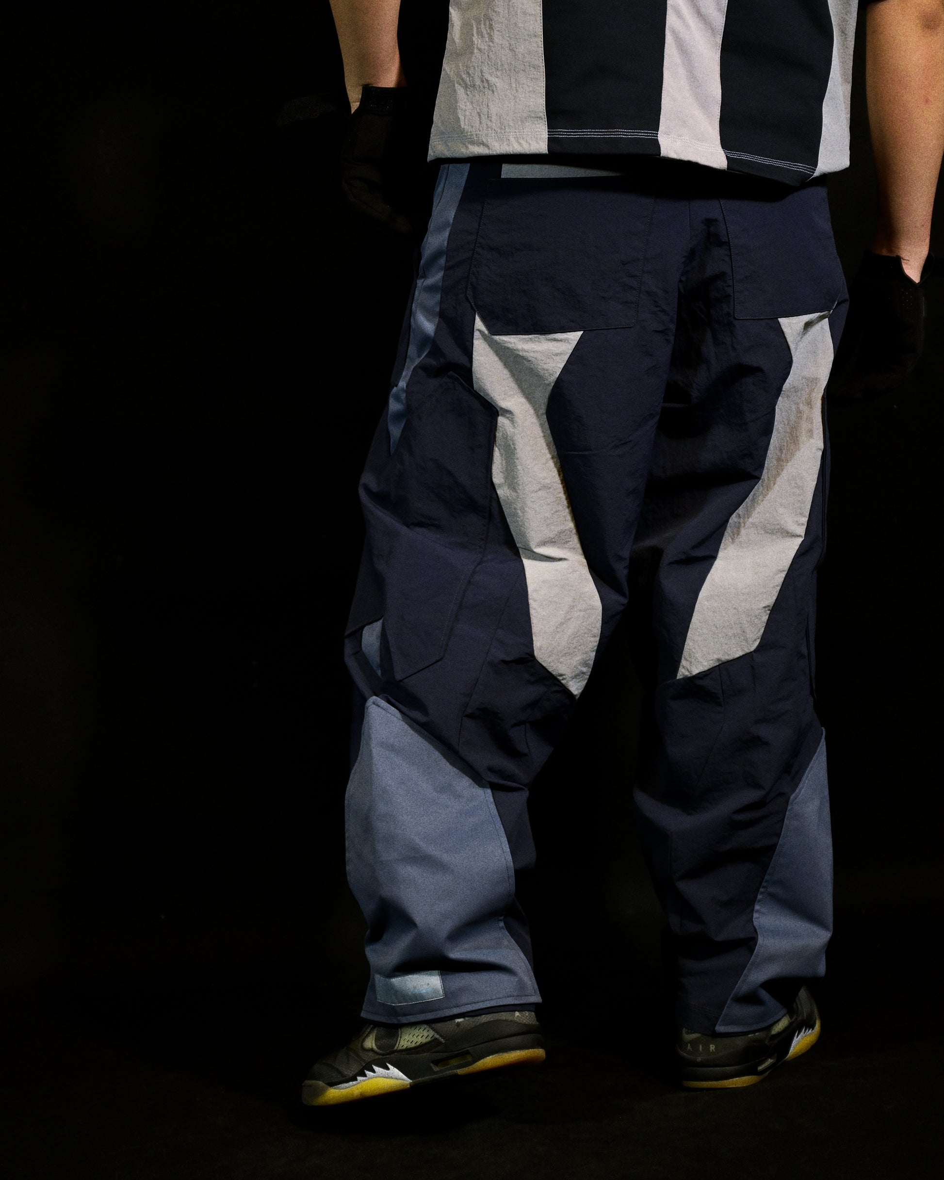 blue techno techwear cyberspace pants, model view
