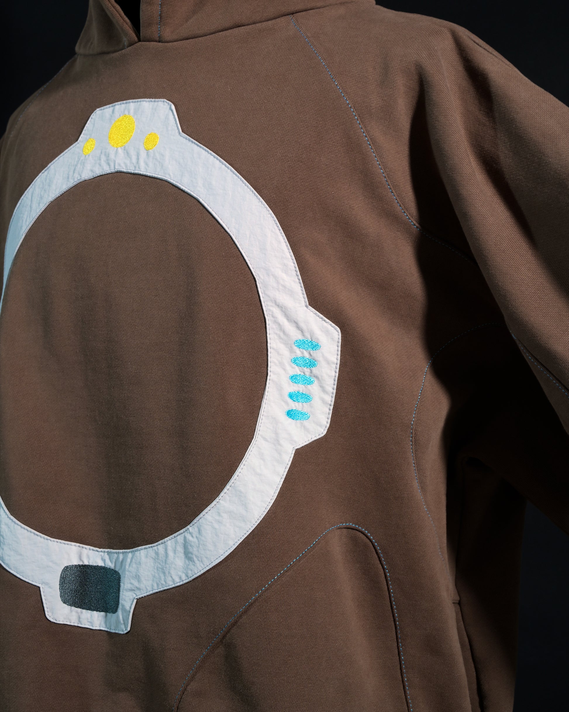 brown dyson sphere galactic space pullover hoodie, detail view
