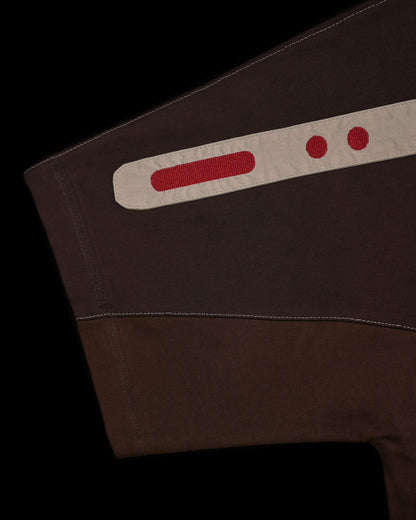 brown earth tone industrial terrain tee, stitching detail view