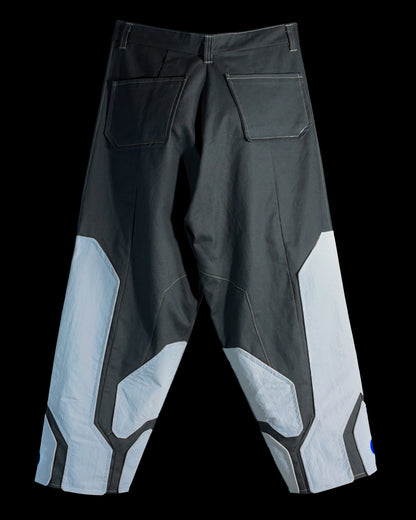 brown grey modular retro futuristic pants, back view