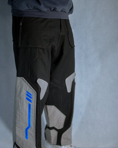 brown grey modular retro futuristic pants, model view