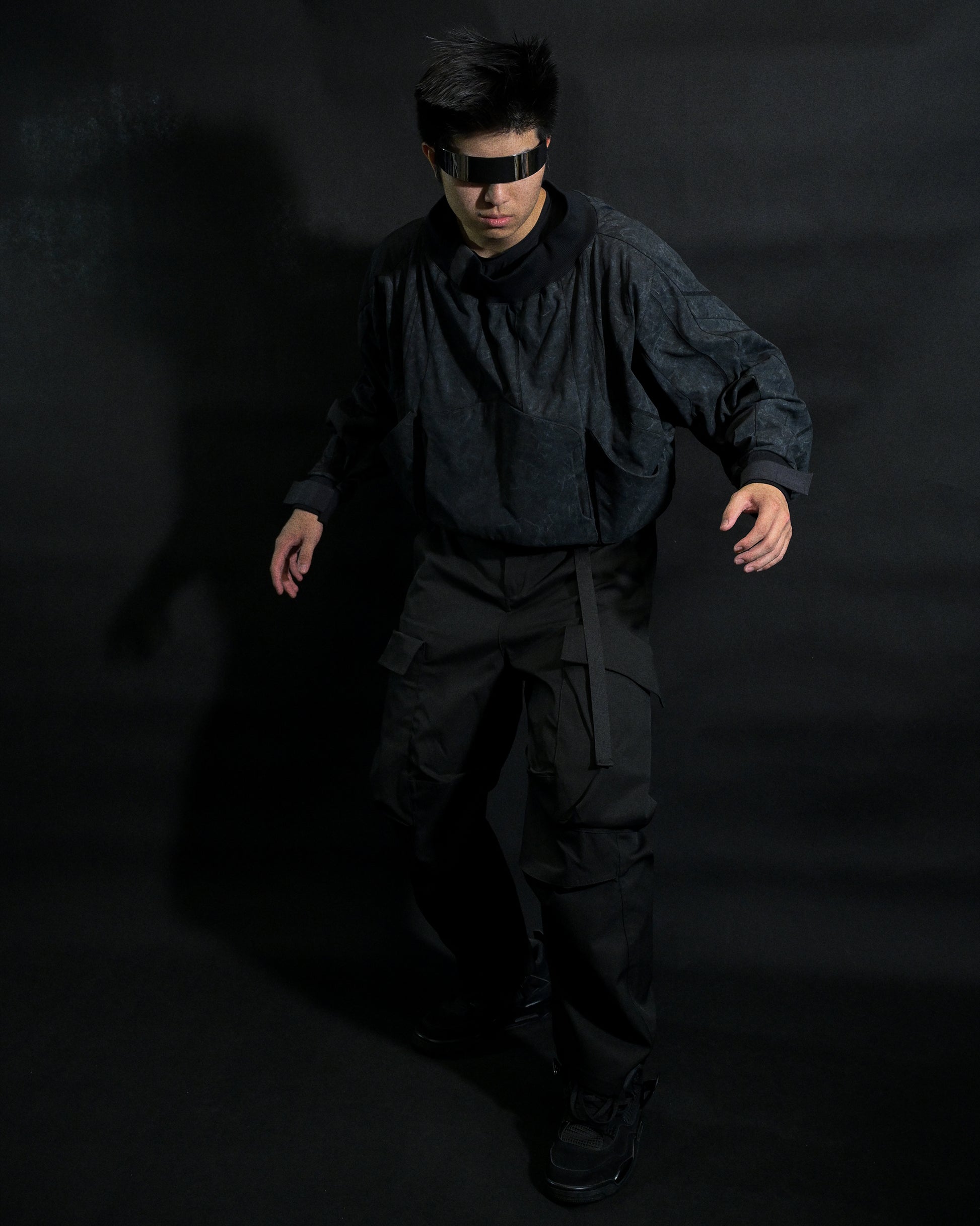 dark black dystopian wasteland cyberpunk long sleeve, front standing view