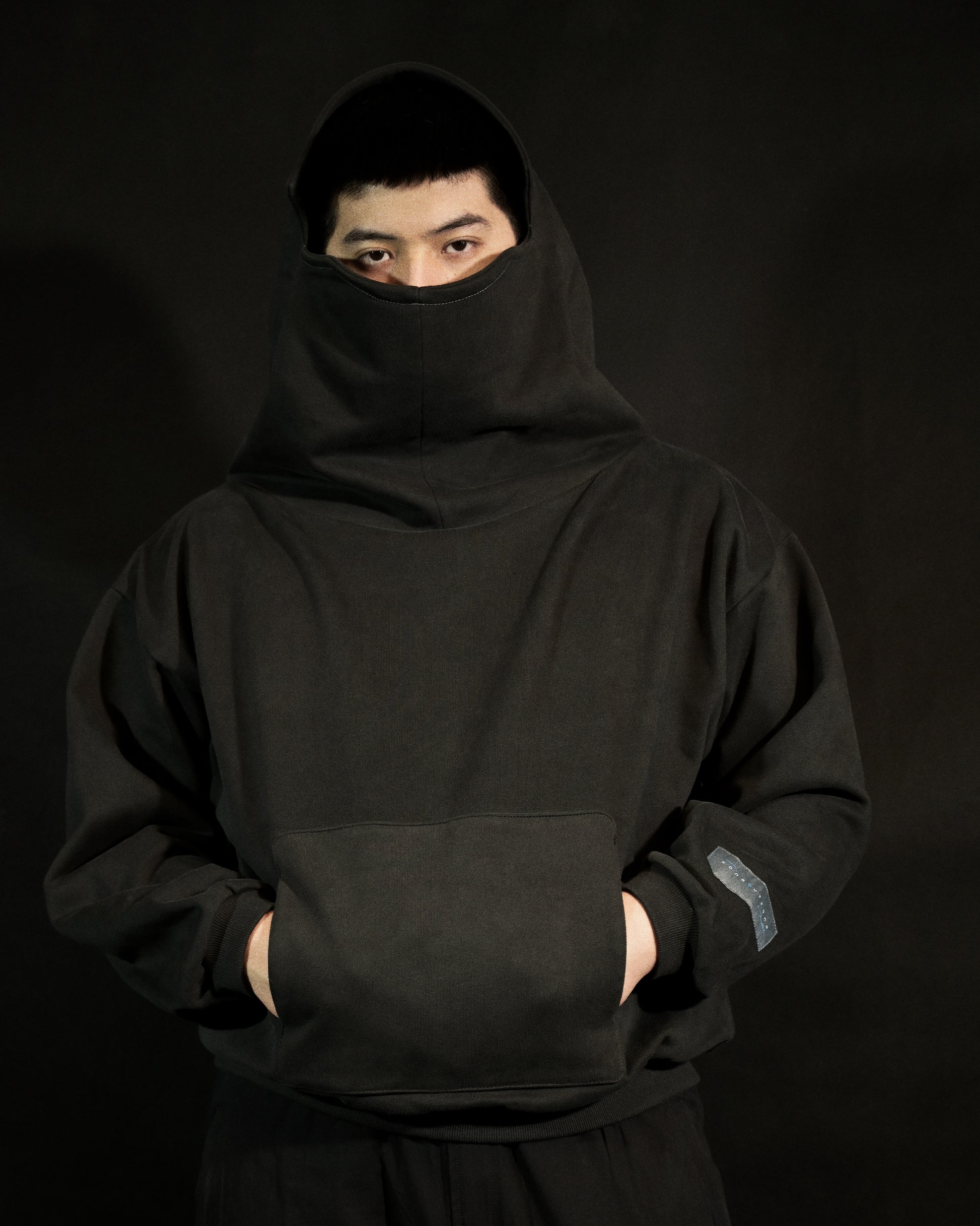 dark grey galactic sci-fi blank streetwear hoodie, front model view