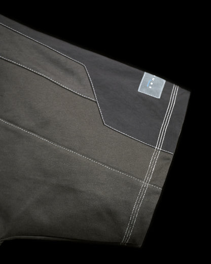 dark grey meta verse cybernetic tee, woven tag