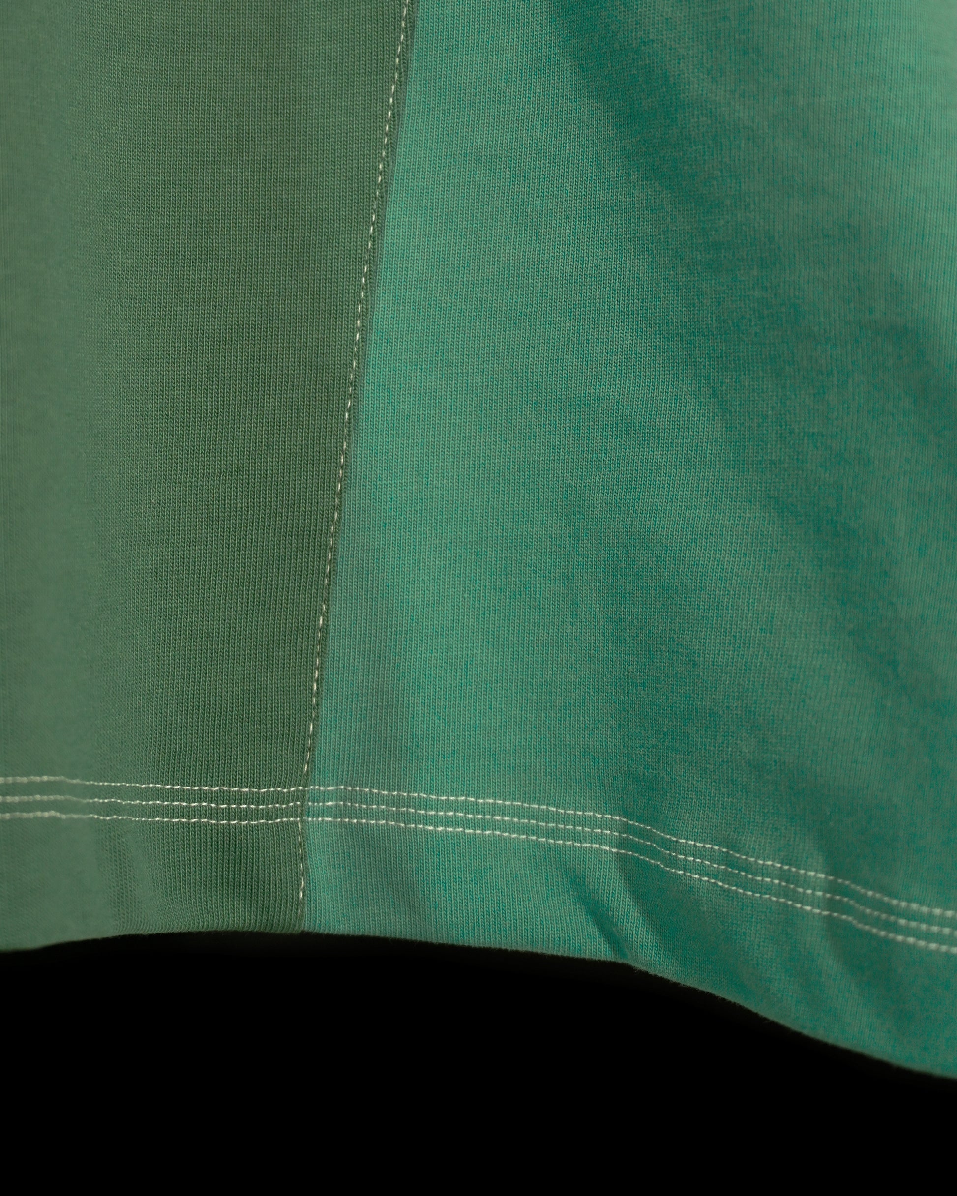 green emerald terraforming earth tone tee, detail stitching view