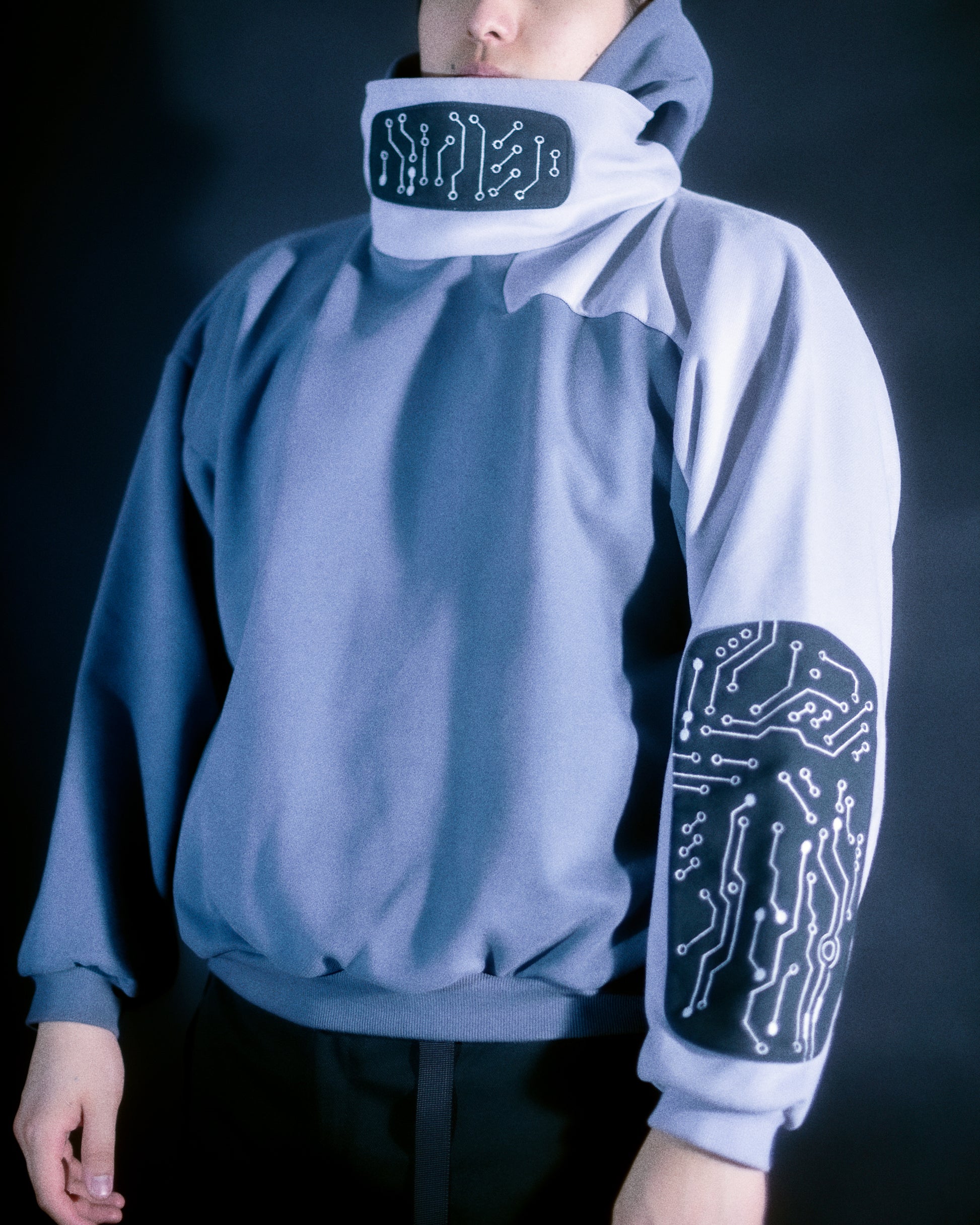 grey techwear grid futuristic pullover hoodie, front model view
