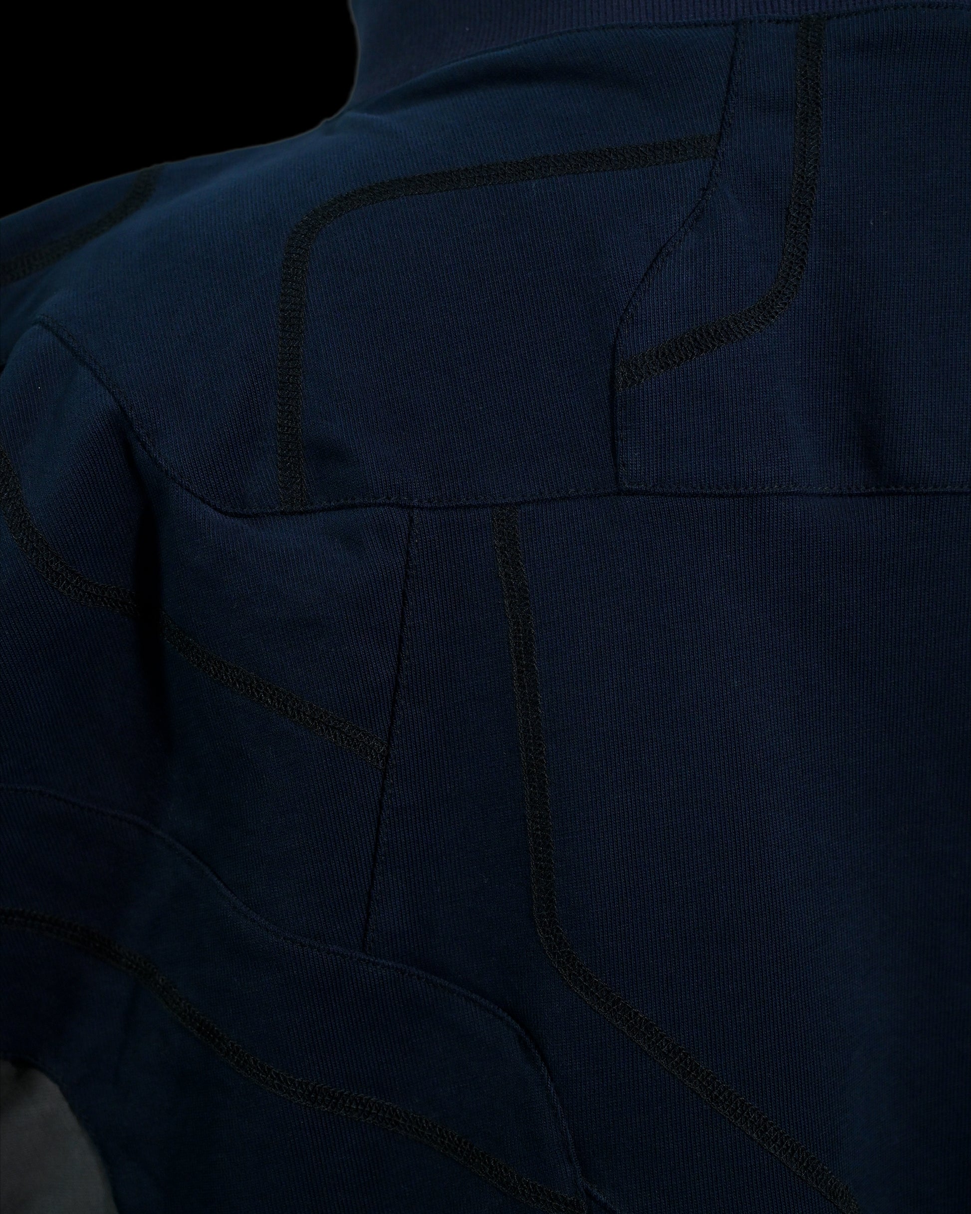navy cloaking experimental sci-fi jacket, stitching detail close up