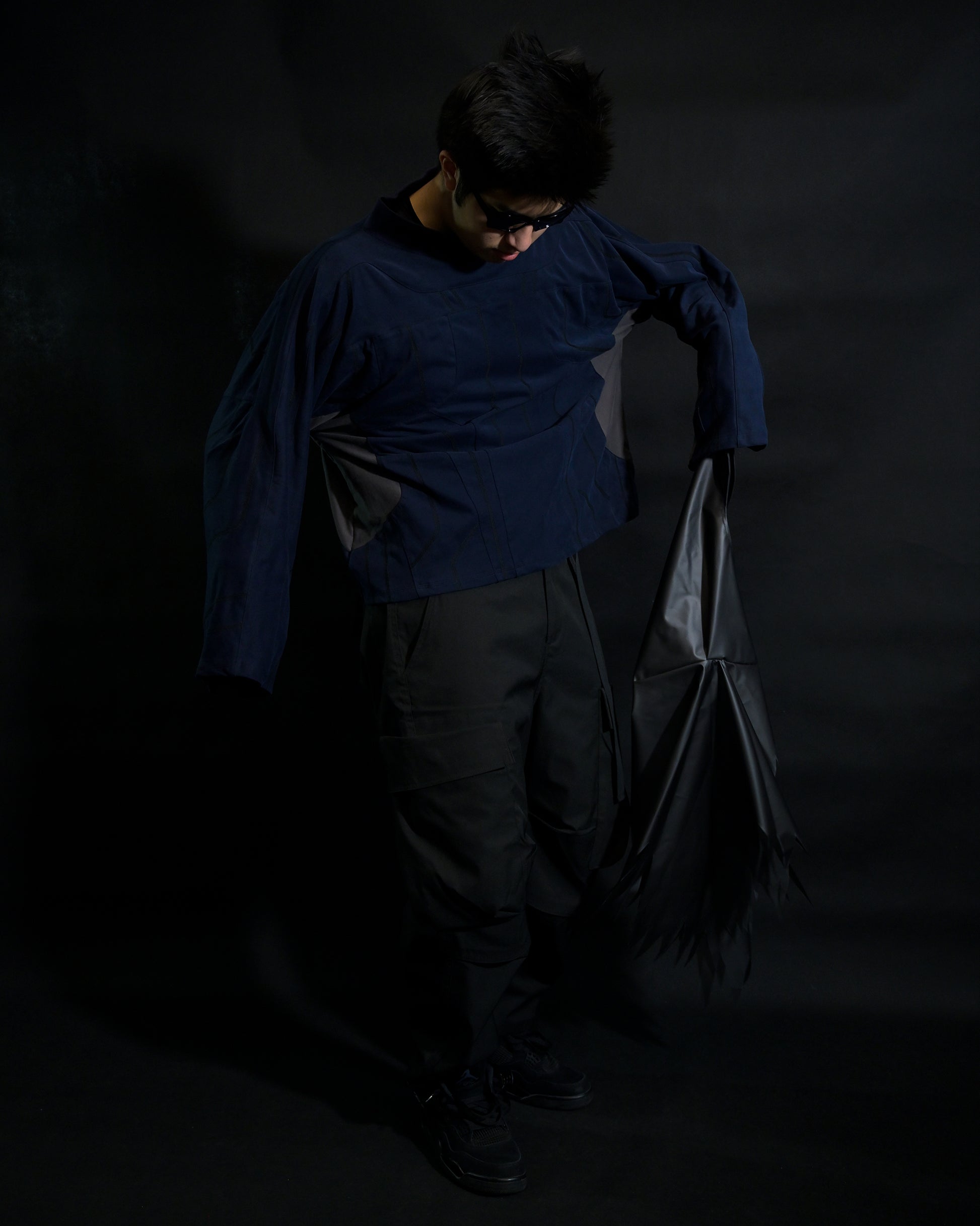 navy cloaking experimental sci-fi jacket, front standing model view