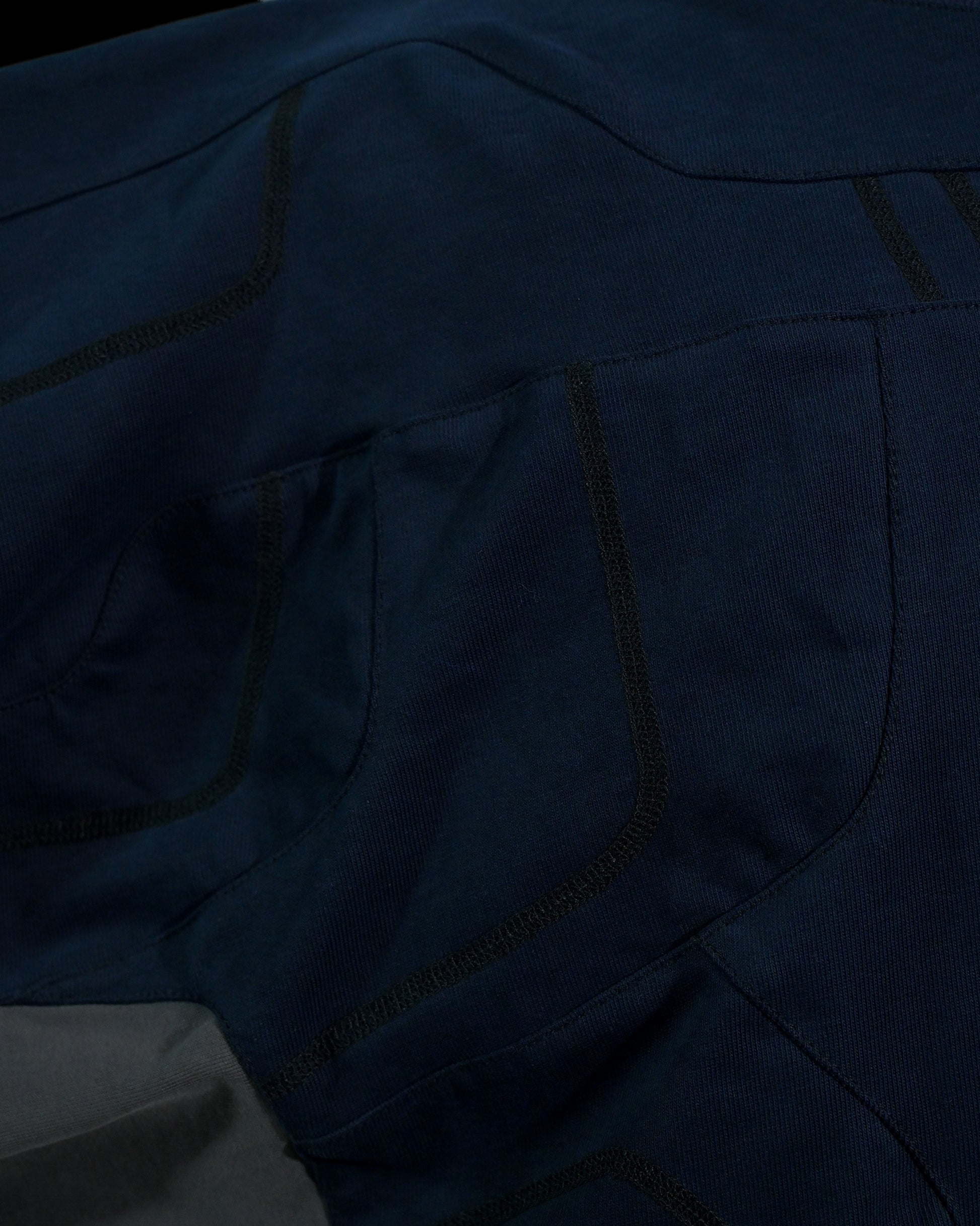 navy cloaking experimental sci-fi jacket, 3 needle overlock stitching view
