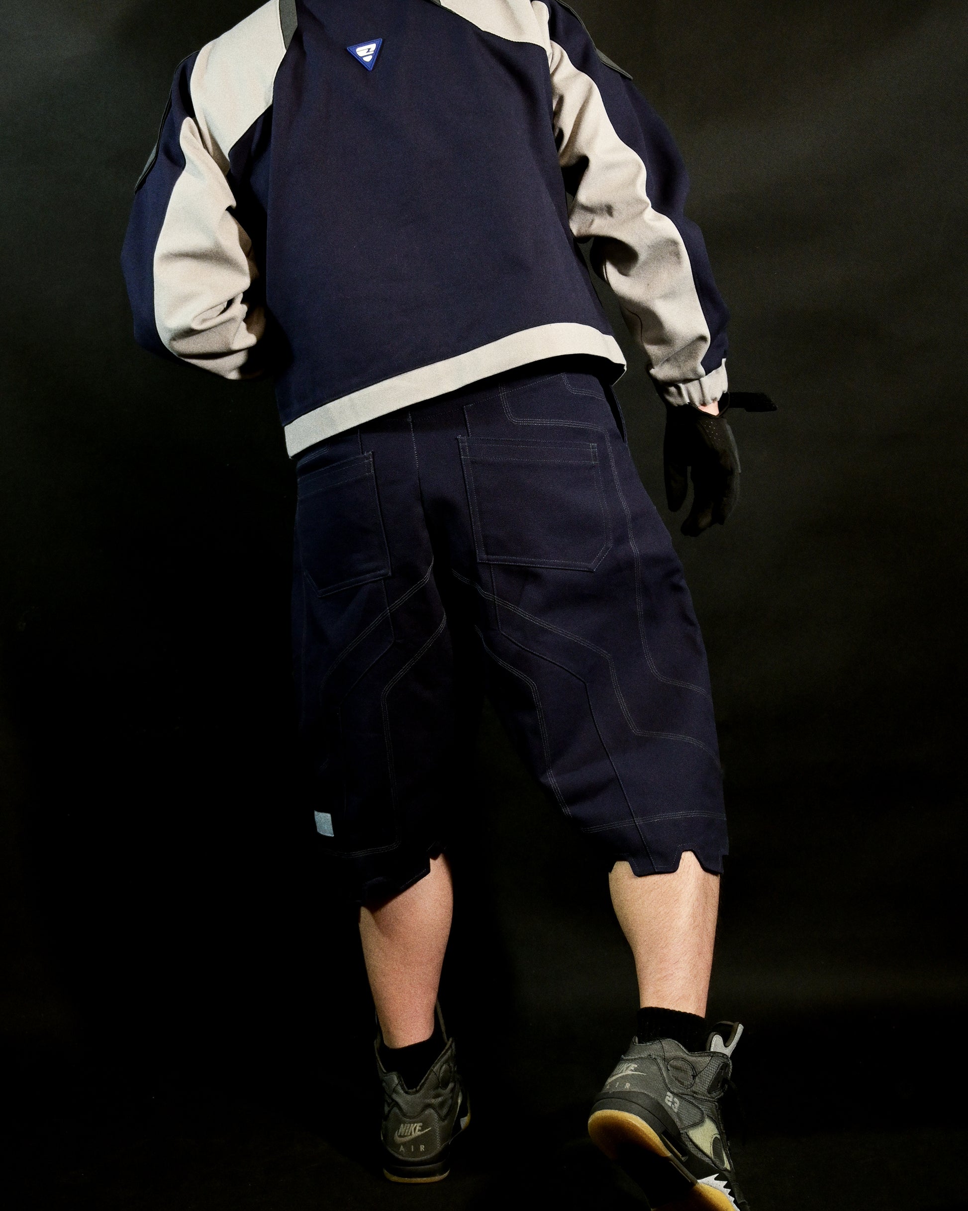navy cotton canvas techwear cybernetic archive fashion shorts, back model